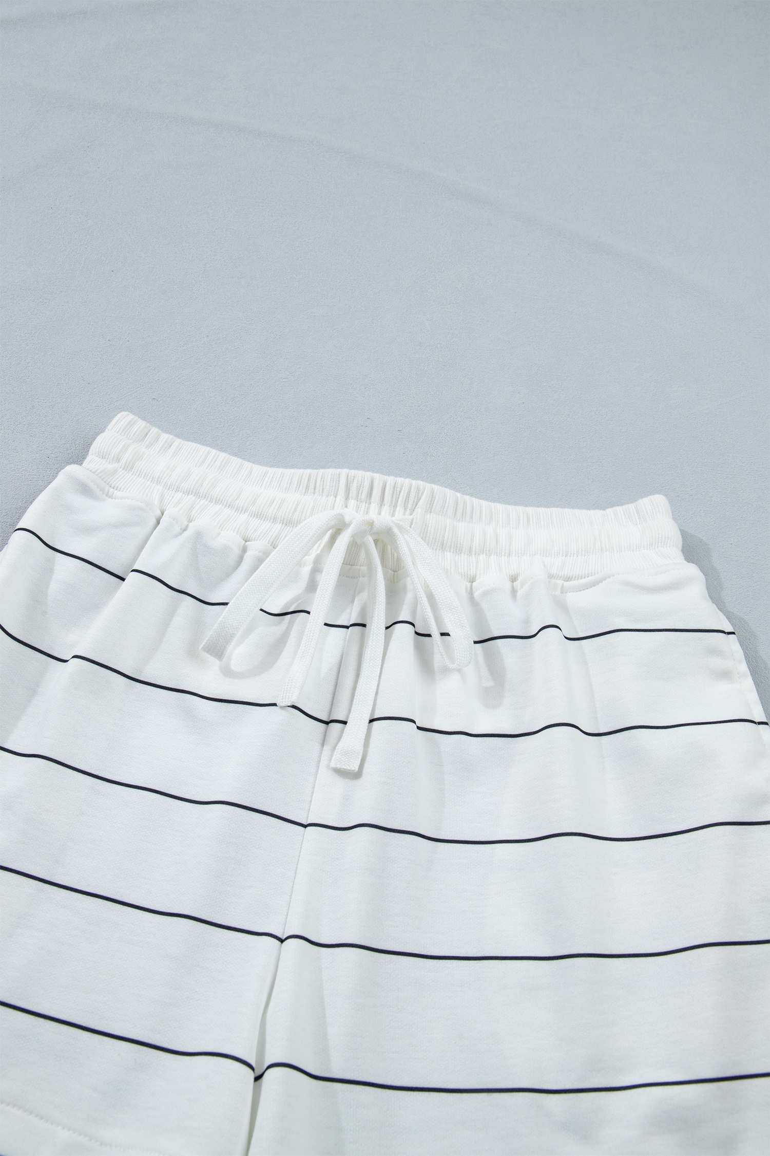 Women's Matching Striped Lounge Set – Comfortable Round Neck Tee and Split Hem Shorts for Daily Wear - Detail View 9 Women's Matching Striped Lounge Set – Comfortable Round Neck Tee and Split Hem Shorts for Daily Wear - Detail View 9