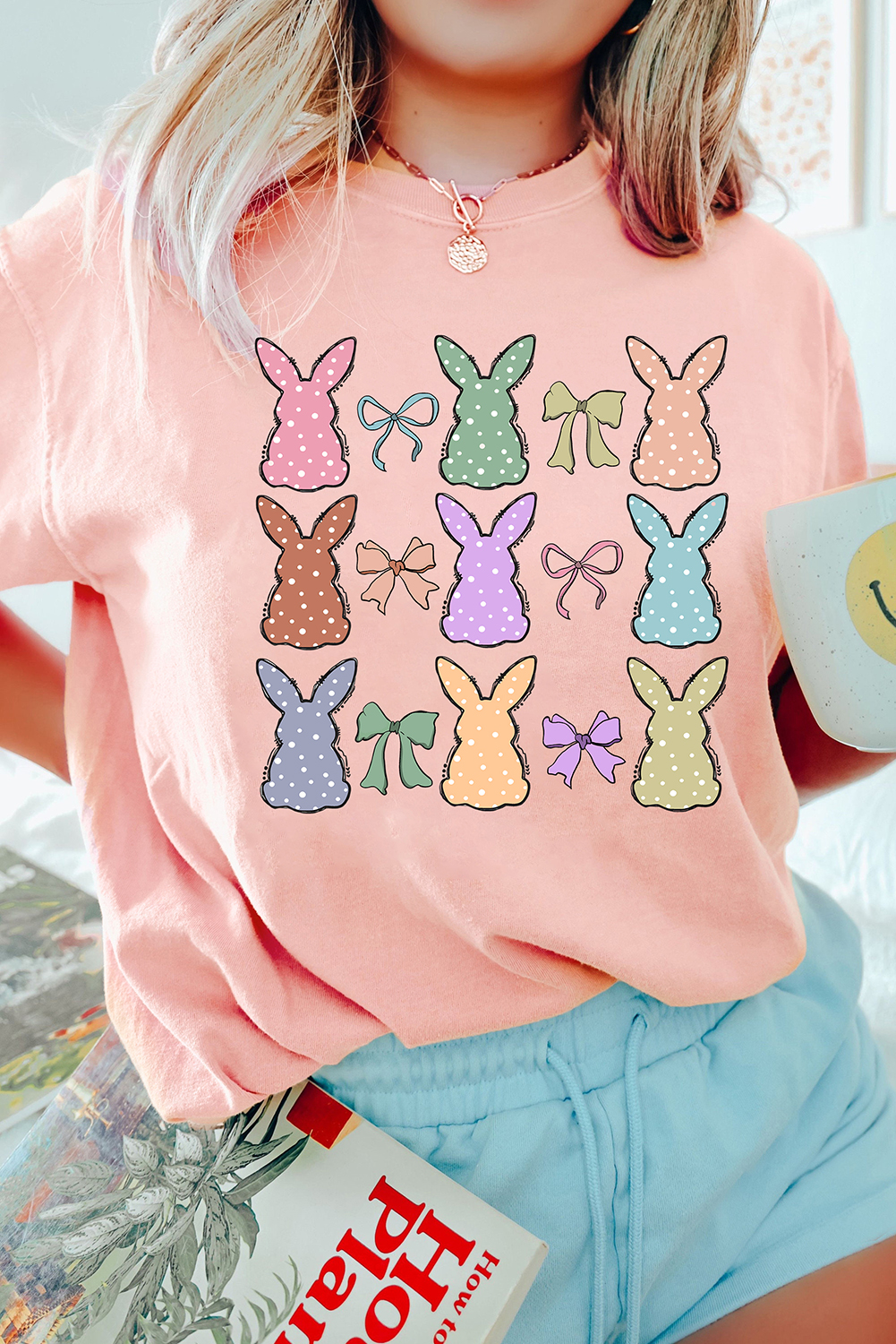 Charming Easter Graphic Tee with Bunny and Bow Design - Perfect for Spring Celebrations - Detail View 2 Charming Easter Graphic Tee with Bunny and Bow Design - Perfect for Spring Celebrations - Detail View 2