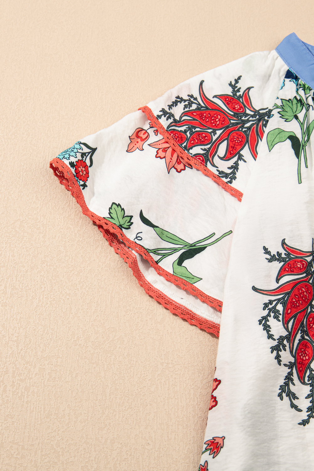 Feminine Casual Blouse with Floral Design, Tassel Tie, and Lace Sleeves - Detail View 7 Feminine Casual Blouse with Floral Design, Tassel Tie, and Lace Sleeves - Detail View 7