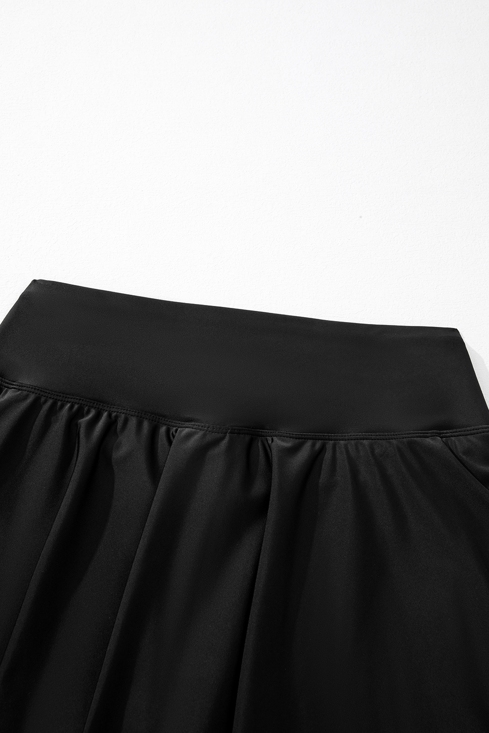 Versatile Black Swim Skort with Crossover Waist for Beach and Pool - Detail View 19 Versatile Black Swim Skort with Crossover Waist for Beach and Pool - Detail View 19