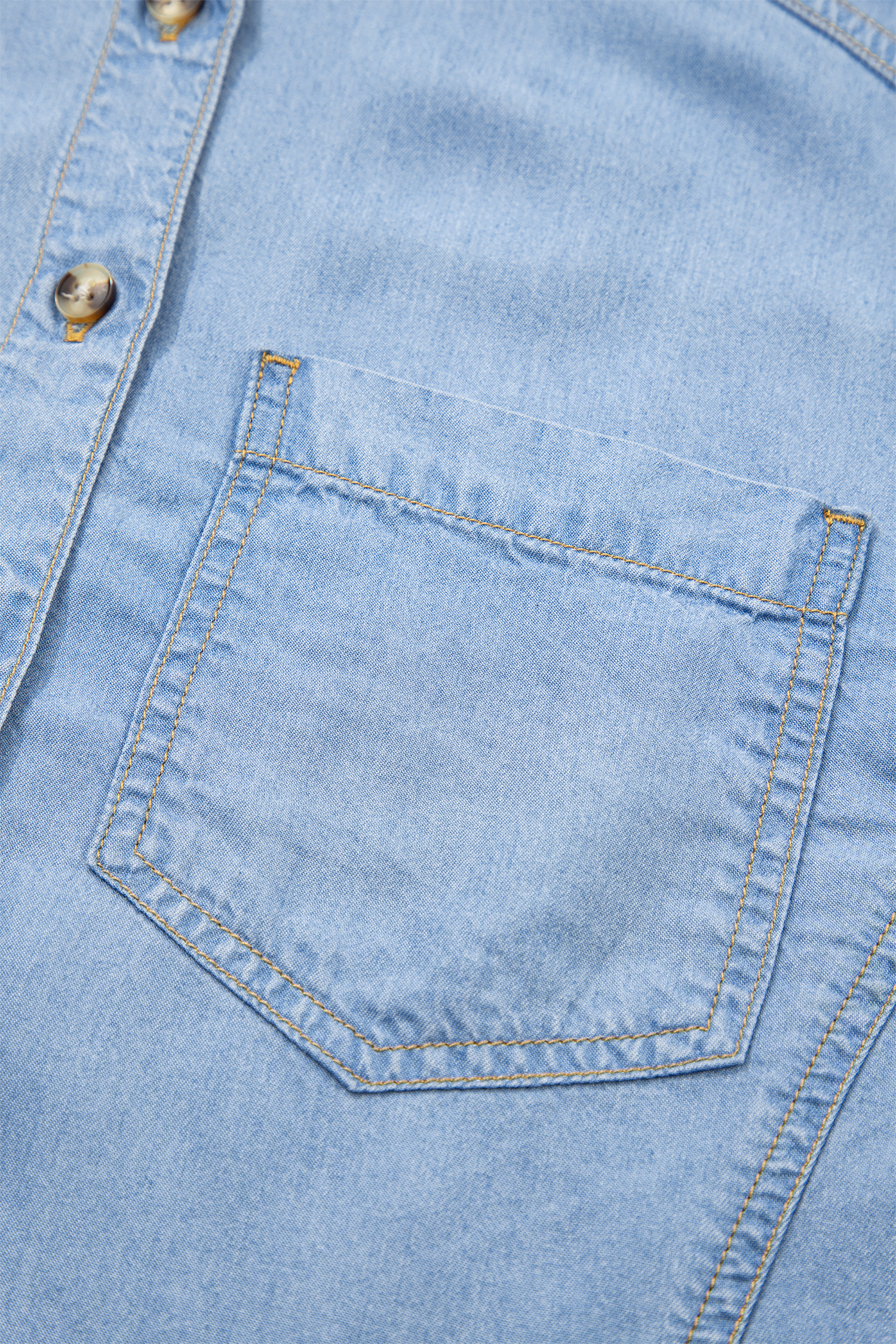 Casual Women's Beau Blue High Low Chambray Shirt with Ruffles – Perfect for Everyday Style - Detail View 9 Casual Women's Beau Blue High Low Chambray Shirt with Ruffles – Perfect for Everyday Style - Detail View 9