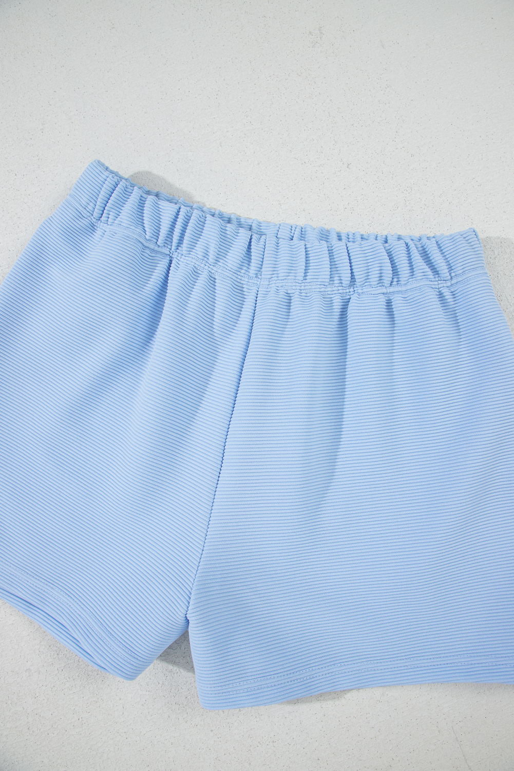 Chic Casual Two-Piece Set: Ribbed Texture Half Zip Top with Ruffle Sleeves and Matching Shorts - Detail View 14 Chic Casual Two-Piece Set: Ribbed Texture Half Zip Top with Ruffle Sleeves and Matching Shorts - Detail View 14