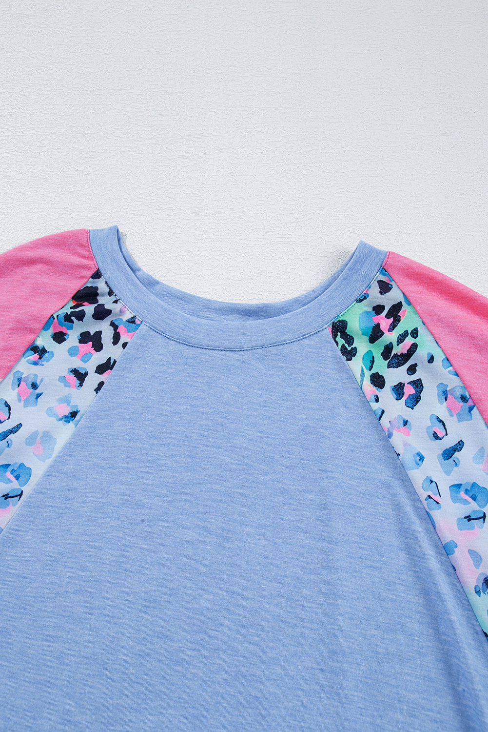 Stylish Plus Size Tee with Unique Leopard Patchwork and Colorblock Design - Detail View 10 Stylish Plus Size Tee with Unique Leopard Patchwork and Colorblock Design - Detail View 10