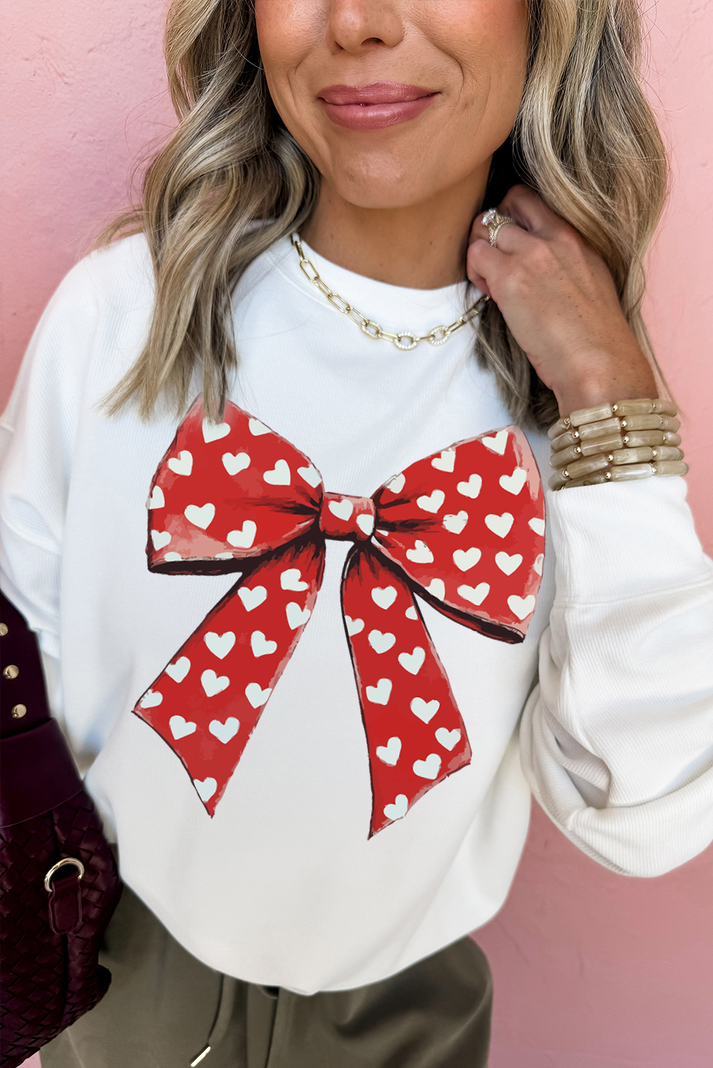Charming Graphic Sweatshirt with Heart Prints and Bow Design - Perfect for Casual Outings - Detail View 2 Charming Graphic Sweatshirt with Heart Prints and Bow Design - Perfect for Casual Outings - Detail View 2
