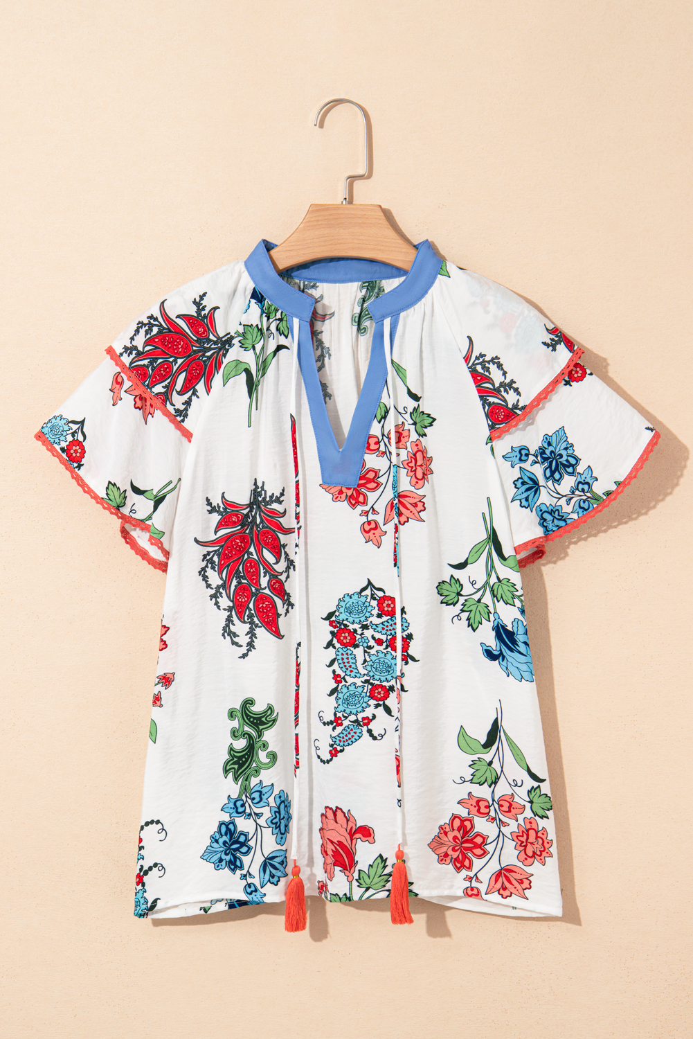Feminine Casual Blouse with Floral Design, Tassel Tie, and Lace Sleeves - Detail View 3 Feminine Casual Blouse with Floral Design, Tassel Tie, and Lace Sleeves - Detail View 3