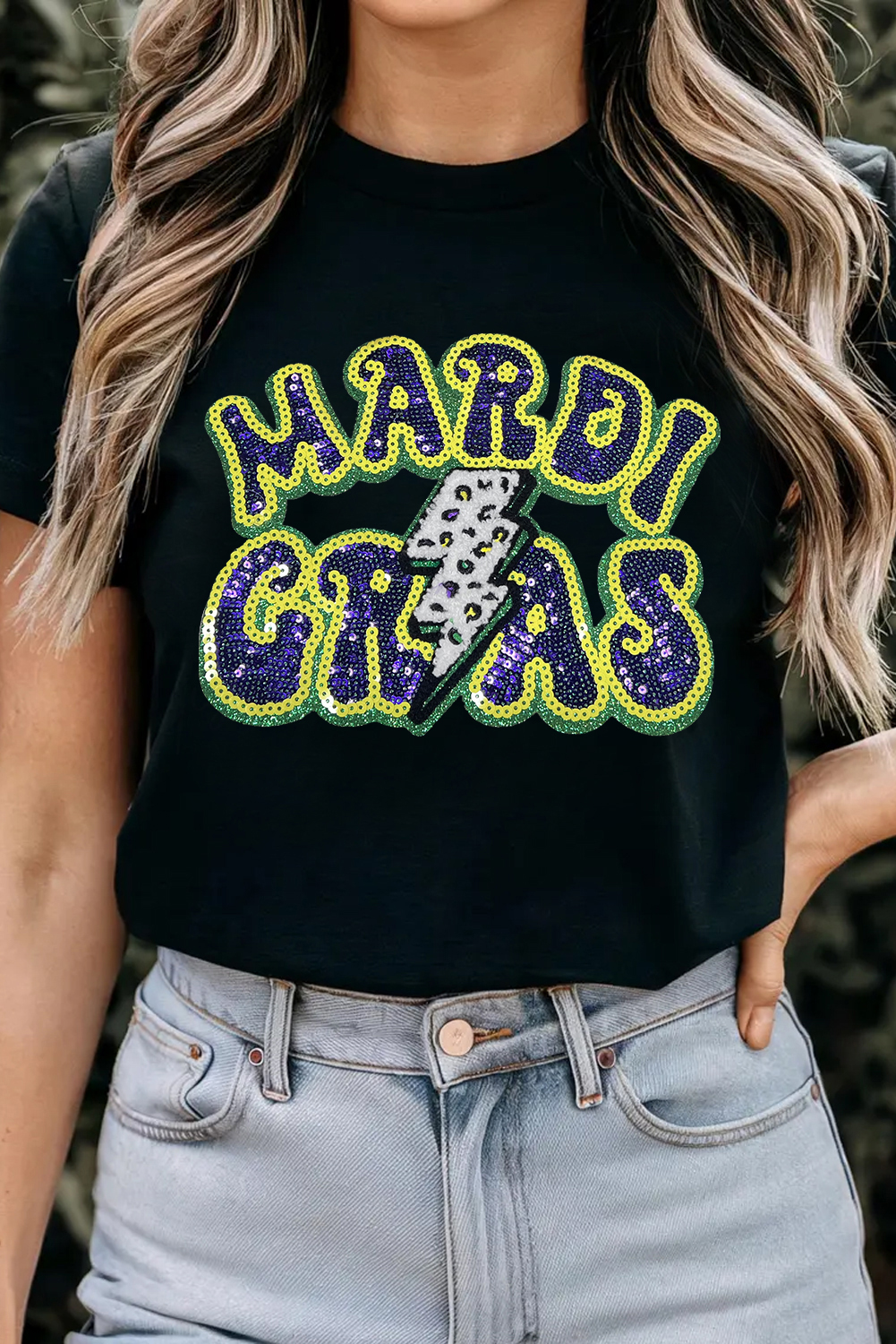 Eye-Catching Black Tee with MARDI GRAS Lettering and Lightning Graphic - Detail View 2 Eye-Catching Black Tee with MARDI GRAS Lettering and Lightning Graphic - Detail View 2