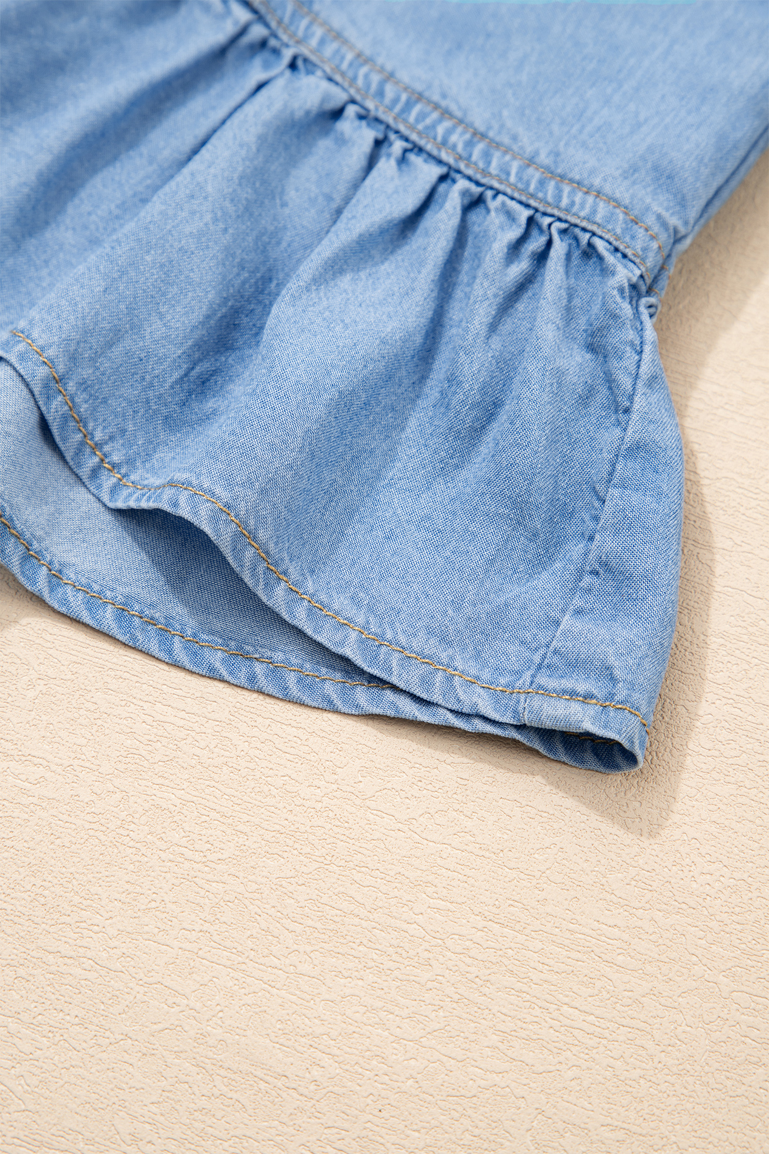 Casual Women's Beau Blue High Low Chambray Shirt with Ruffles – Perfect for Everyday Style - Detail View 12 Casual Women's Beau Blue High Low Chambray Shirt with Ruffles – Perfect for Everyday Style - Detail View 12