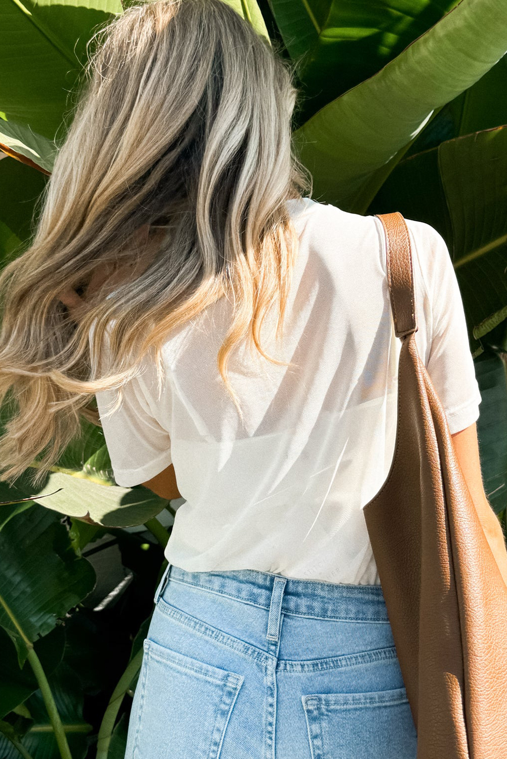 Stylish Solid Color Crew Neck Top with Intricate Mesh Detailing for Women - Detail View 2 Stylish Solid Color Crew Neck Top with Intricate Mesh Detailing for Women - Detail View 2