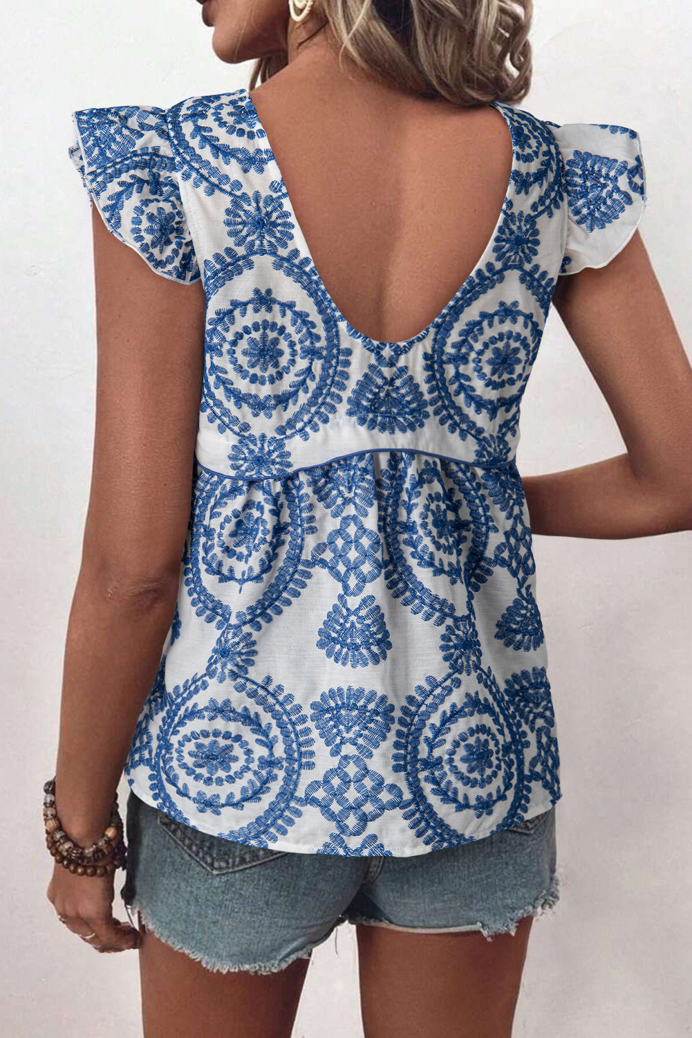 Stylish and Versatile Blue Flutter Sleeve Blouse with Bohemian Print - Detail View 2 Stylish and Versatile Blue Flutter Sleeve Blouse with Bohemian Print - Detail View 2