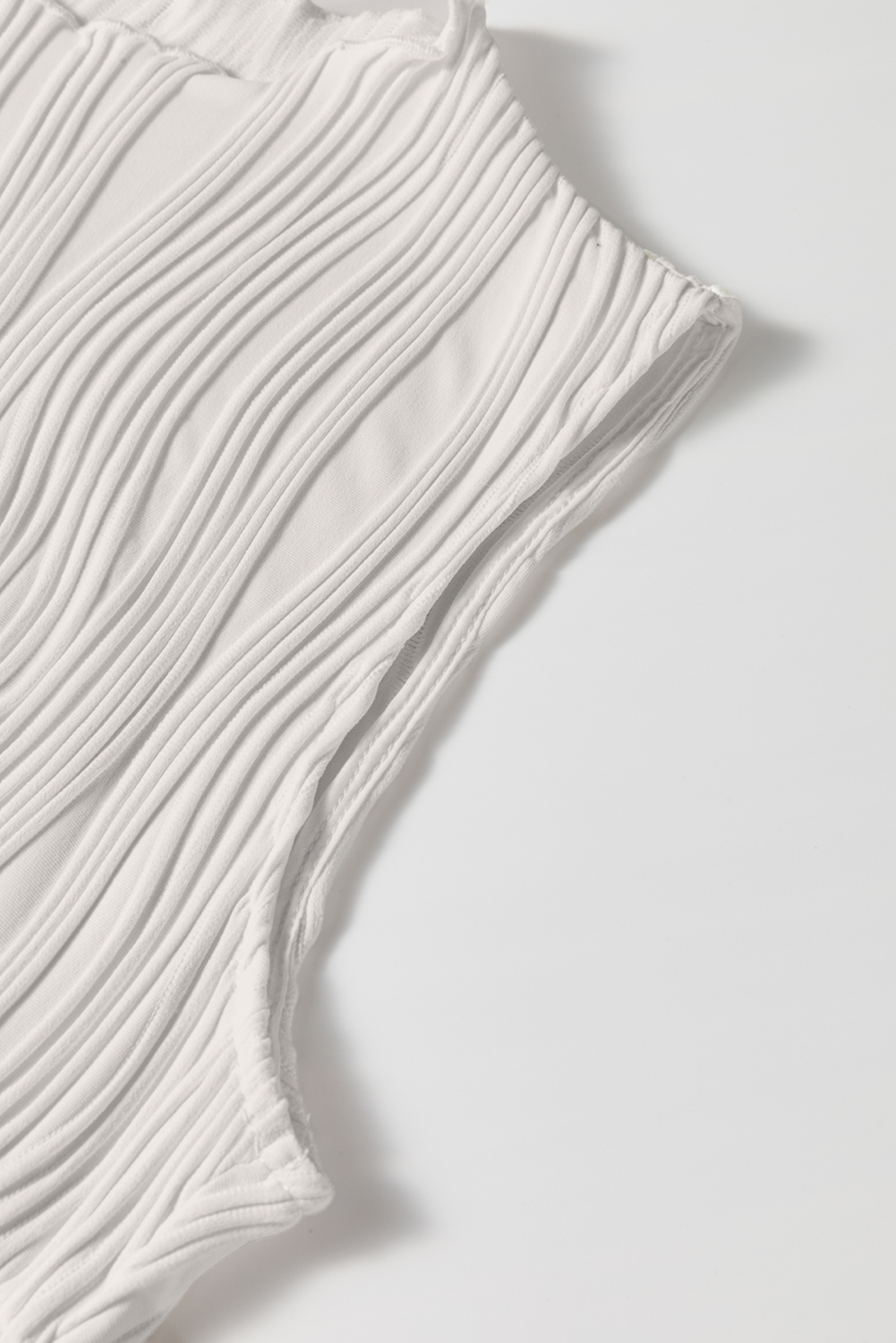Stylish and Comfortable Women's Solid Color Tank Top with Unique Wavy Texture - Detail View 10 Stylish and Comfortable Women's Solid Color Tank Top with Unique Wavy Texture - Detail View 10