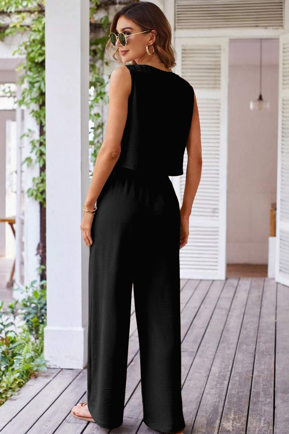 Stylish 2-Piece Black Ensemble: Buttoned Crop Vest & Relaxed Wide Leg Pants - Detail View 3 Stylish 2-Piece Black Ensemble: Buttoned Crop Vest & Relaxed Wide Leg Pants - Detail View 3