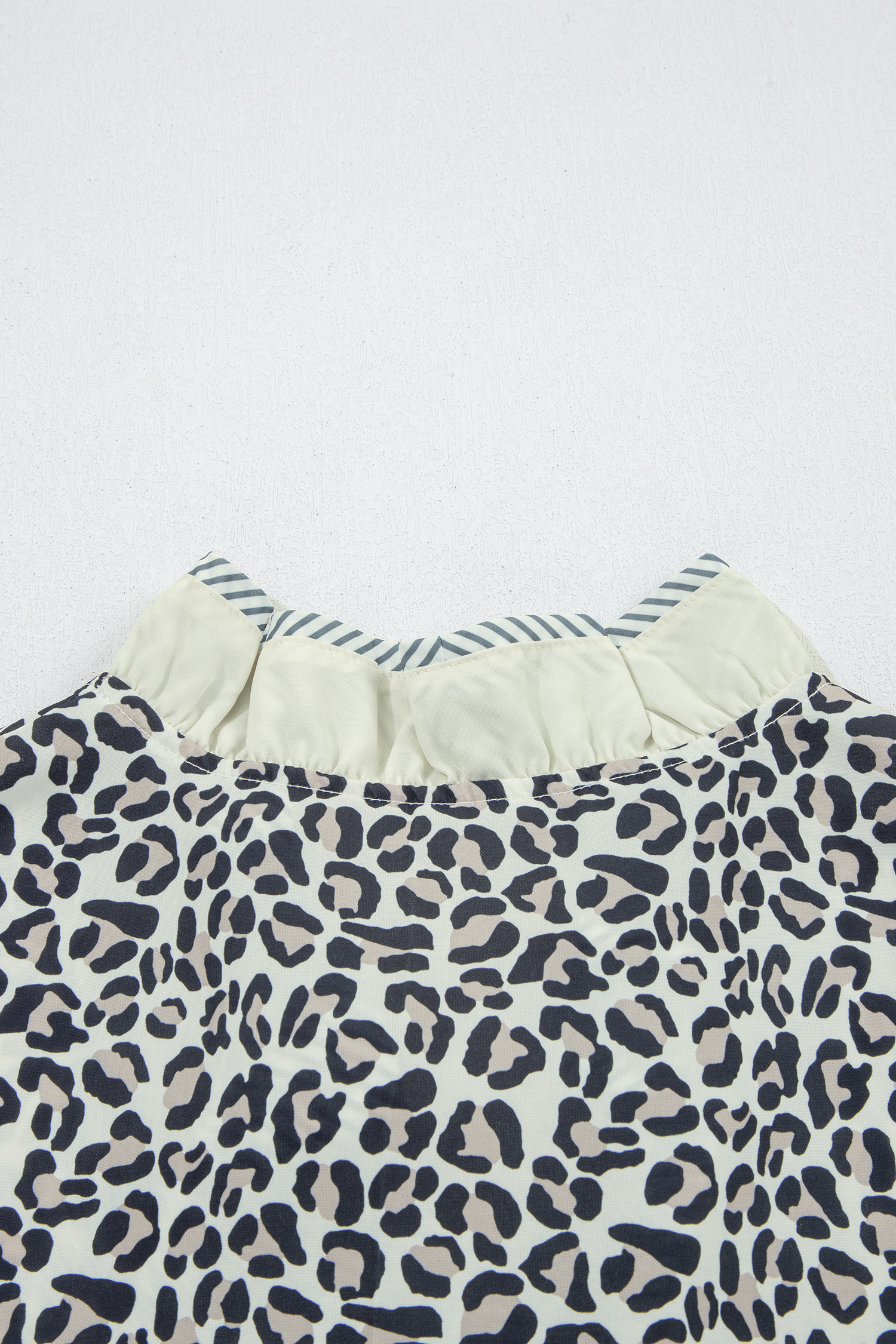 Stylish Women's Leopard Print Shift Blouse – Frilled V Neck Short Sleeve Shirt, Trendy Fashion Gift for Her - Detail View 9 Stylish Women's Leopard Print Shift Blouse – Frilled V Neck Short Sleeve Shirt, Trendy Fashion Gift for Her - Detail View 9