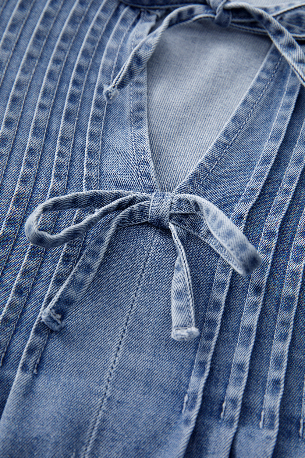 Chic Myosotis Denim Bow Tie Puff Sleeve Top with Pintuck Details - Detail View 9 Chic Myosotis Denim Bow Tie Puff Sleeve Top with Pintuck Details - Detail View 9