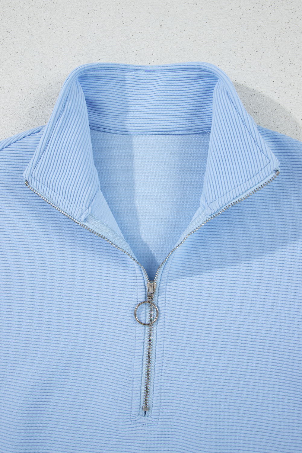 Chic Casual Two-Piece Set: Ribbed Texture Half Zip Top with Ruffle Sleeves and Matching Shorts - Detail View 10 Chic Casual Two-Piece Set: Ribbed Texture Half Zip Top with Ruffle Sleeves and Matching Shorts - Detail View 10