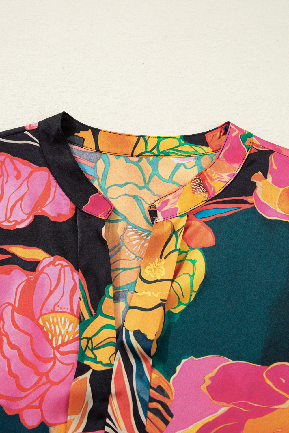 Elegant Black Floral Print V Neck Blouse with Smocked Cuffs and Puff Sleeves - Detail View 5 Elegant Black Floral Print V Neck Blouse with Smocked Cuffs and Puff Sleeves - Detail View 5