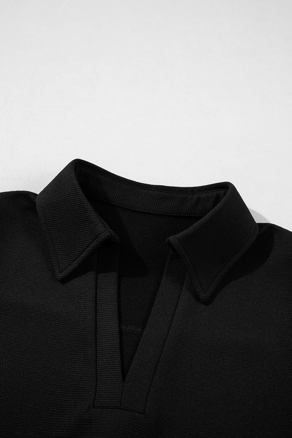 Chic and Elegant Black Mini Dress with Slit Neck and Sleeveless Design - Detail View 22 Chic and Elegant Black Mini Dress with Slit Neck and Sleeveless Design - Detail View 22