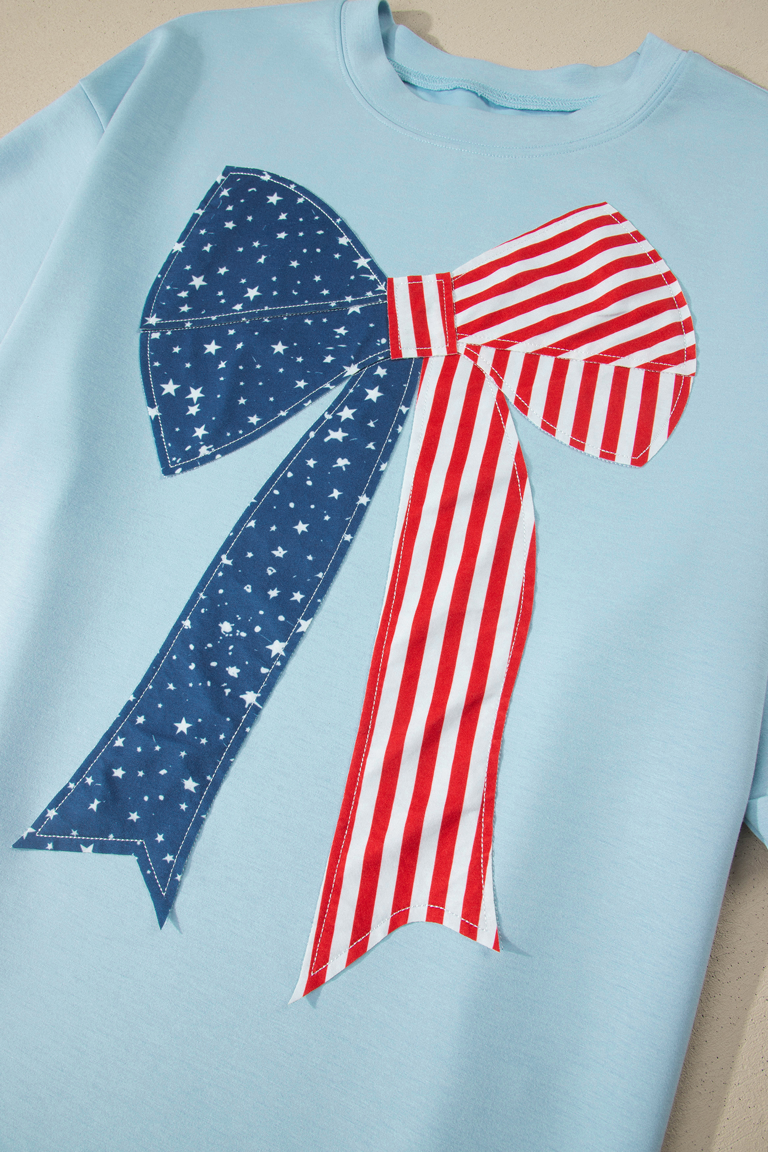 Women's Patriotic Bow Graphic T-Shirt – Beau Blue Short Sleeve Casual Summer Top - Detail View 7 Women's Patriotic Bow Graphic T-Shirt – Beau Blue Short Sleeve Casual Summer Top - Detail View 7