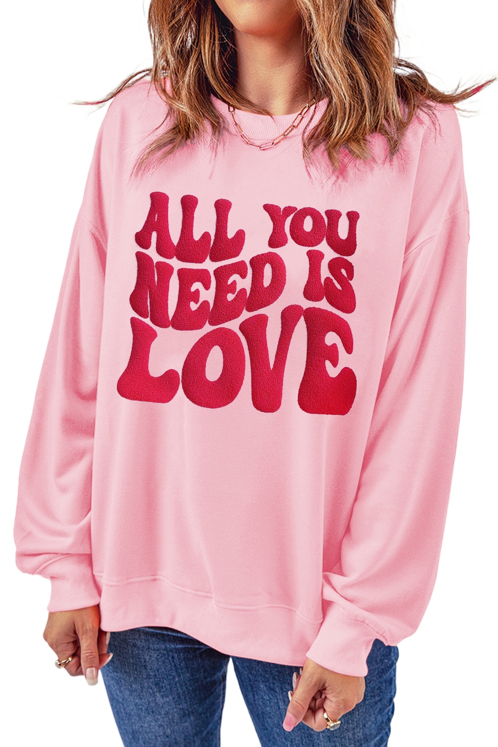Women's Pink 'All You Need Is Love' Valentine's Slogan Graphic Sweatshirt - Main View Women's Pink 'All You Need Is Love' Valentine's Slogan Graphic Sweatshirt - Main View