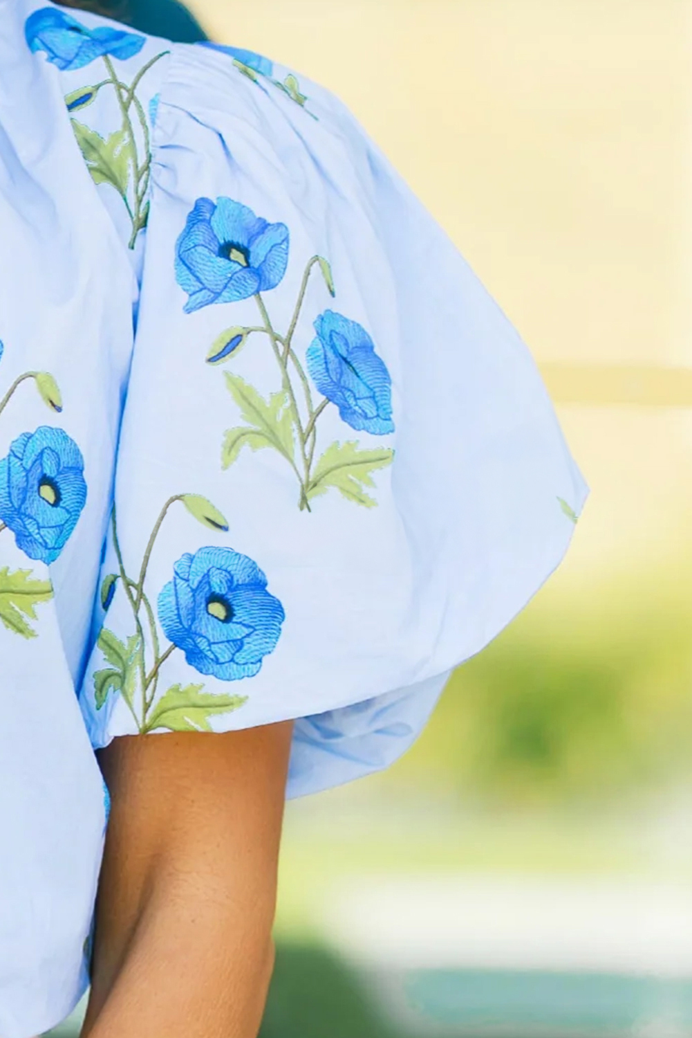 Women’s Sky Blue Floral Print Tie Split Neck Short Puff Sleeve Blouse - Casual Summer Top - Detail View 5 Women’s Sky Blue Floral Print Tie Split Neck Short Puff Sleeve Blouse - Casual Summer Top - Detail View 5