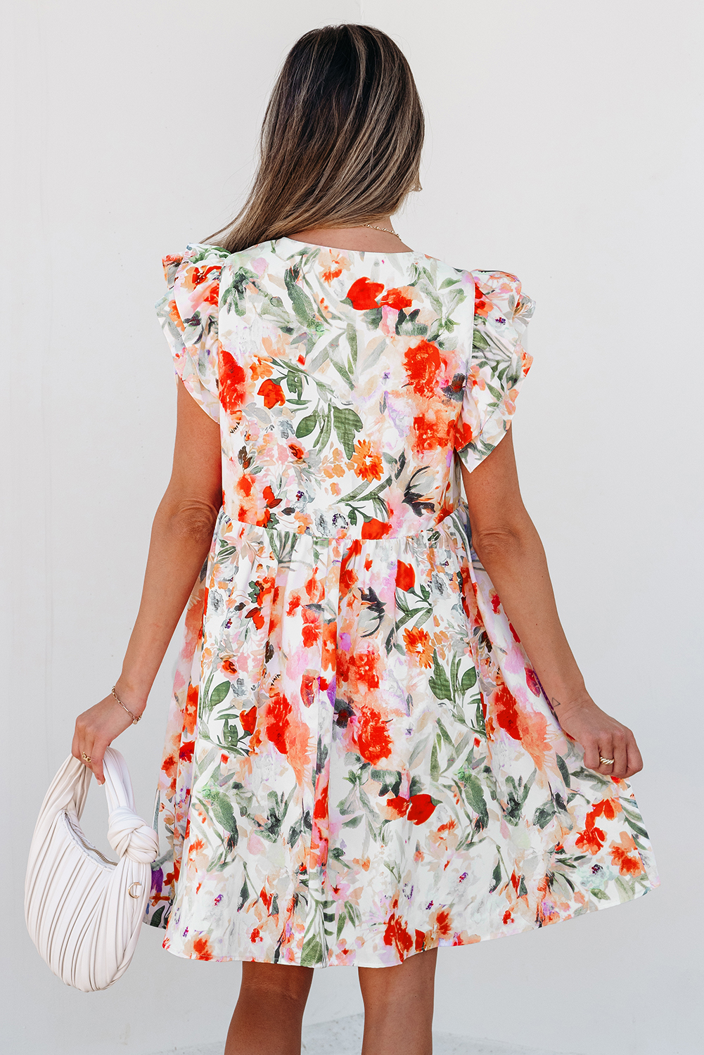 Charming Floral Mini Dress with Ruffle Sleeves and Empire Waist for a Slimming Effect - Detail View 2 Charming Floral Mini Dress with Ruffle Sleeves and Empire Waist for a Slimming Effect - Detail View 2