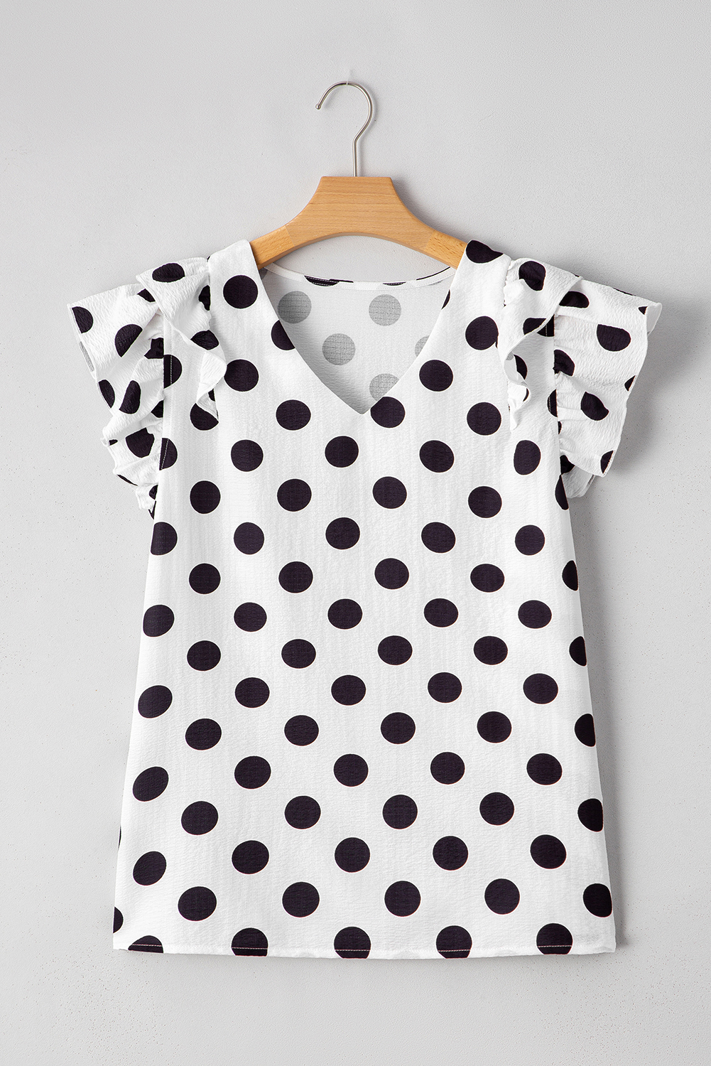 Flowy Women's V Neck Blouse - White Polka Dot Design with Playful Ruffled Sleeves - Detail View 7 Flowy Women's V Neck Blouse - White Polka Dot Design with Playful Ruffled Sleeves - Detail View 7