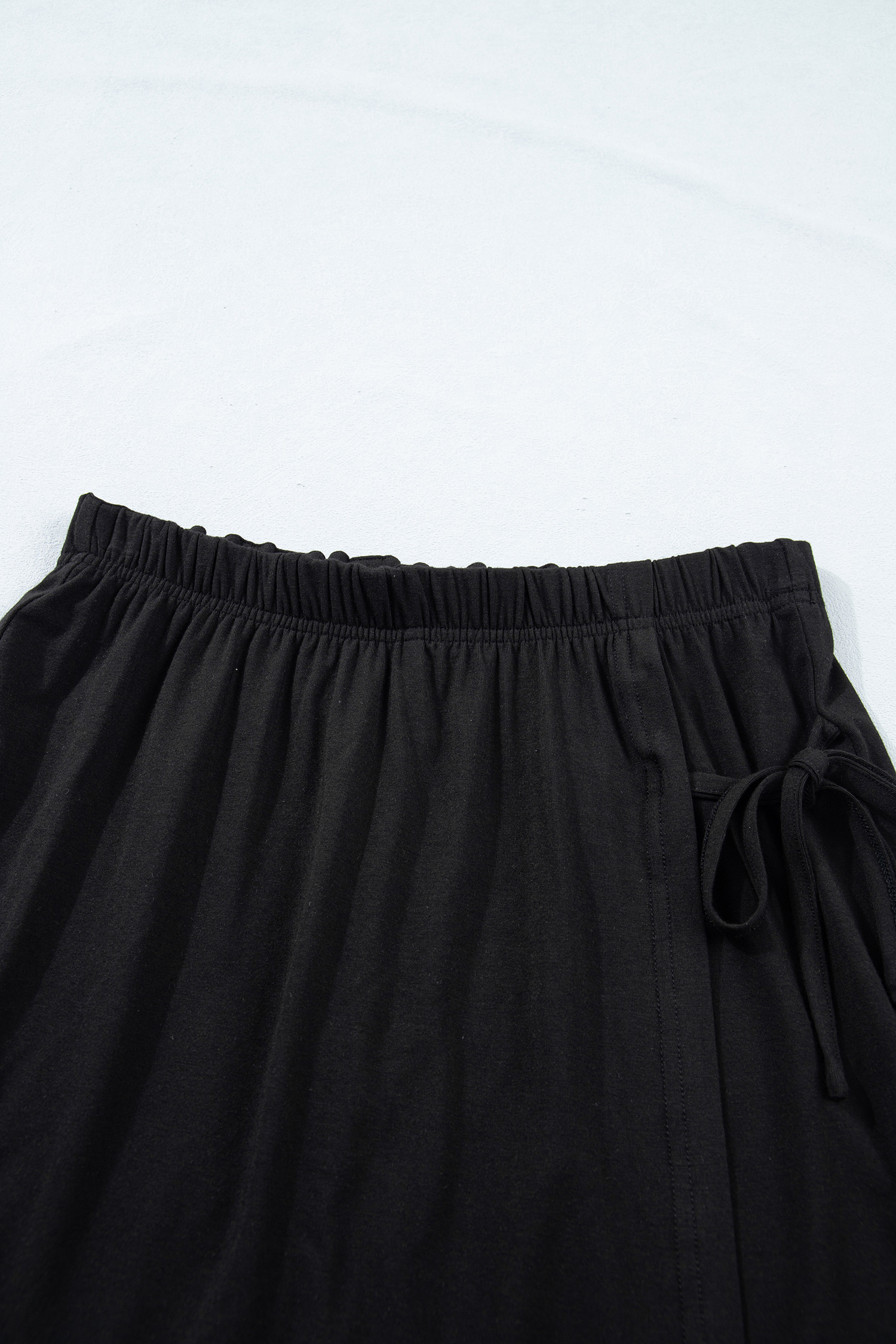 Women's Soft Viscose Loungewear Set – Oversized Tee and Tie Detail Skort, Casual 2-Piece Black Outfit - Detail View 15 Women's Soft Viscose Loungewear Set – Oversized Tee and Tie Detail Skort, Casual 2-Piece Black Outfit - Detail View 15