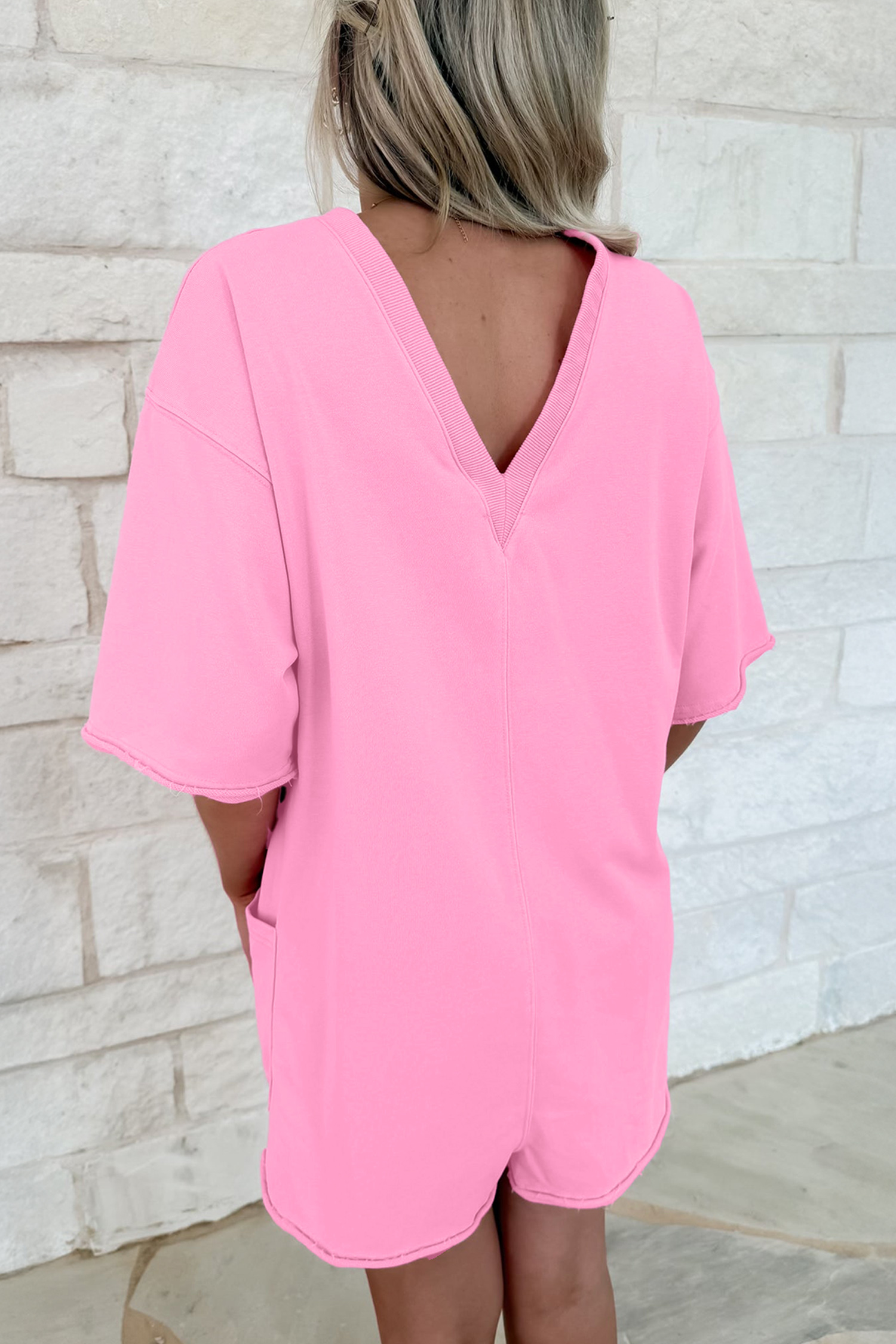 Versatile Pink Raw Edge Romper for Women – Stylish Half Sleeve with Pocket for Summer Outings - Detail View 2 Versatile Pink Raw Edge Romper for Women – Stylish Half Sleeve with Pocket for Summer Outings - Detail View 2