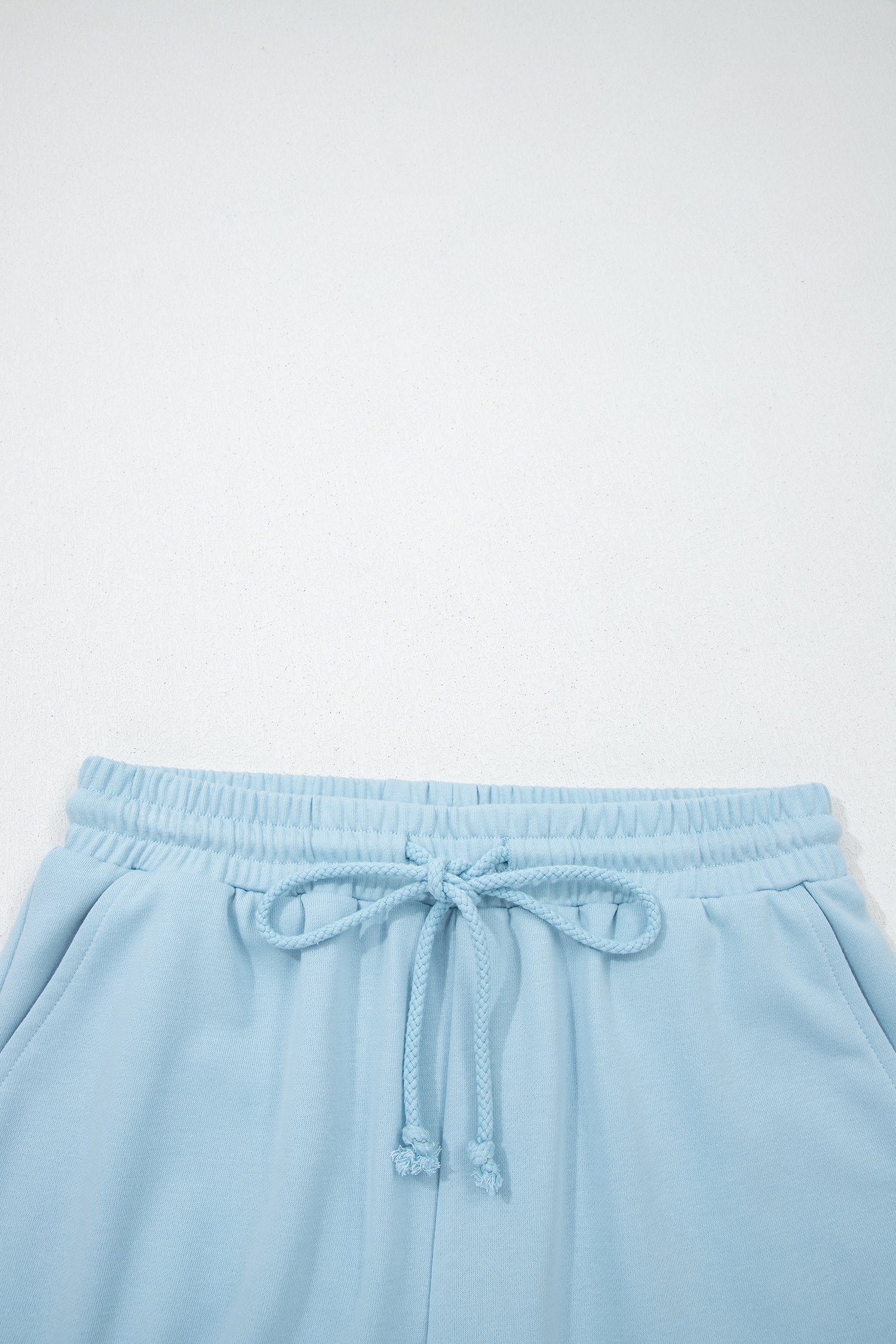 Summer Casual 2-Piece Set for Women – Mist Blue Solid Color Loose Tee and Comfortable Drawstring Shorts - Detail View 8 Summer Casual 2-Piece Set for Women – Mist Blue Solid Color Loose Tee and Comfortable Drawstring Shorts - Detail View 8