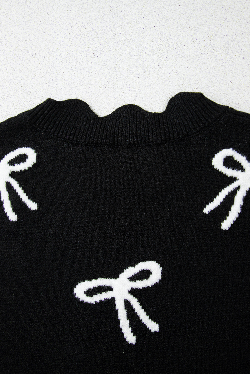 Women's Black Bow Print Scalloped Hem Short Sleeve Sweater T-Shirt - Detail View 9 Women's Black Bow Print Scalloped Hem Short Sleeve Sweater T-Shirt - Detail View 9