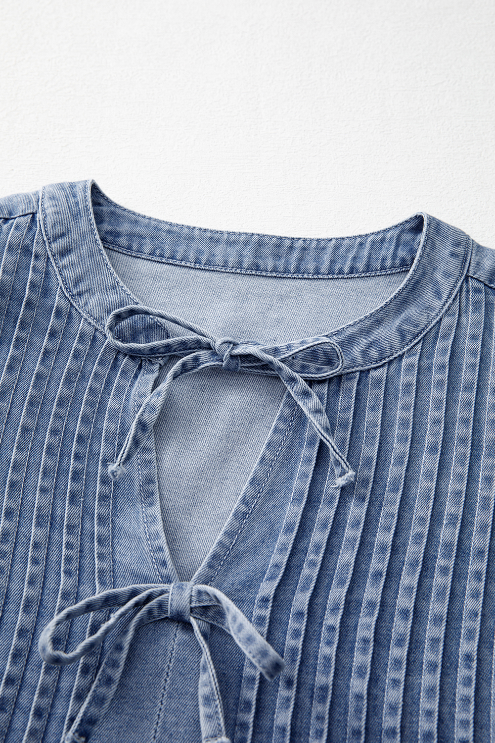 Fashionable Women's Myosotis Blue Chambray Top - Puff Sleeves and Bow Tie - Detail View 10 Fashionable Women's Myosotis Blue Chambray Top - Puff Sleeves and Bow Tie - Detail View 10