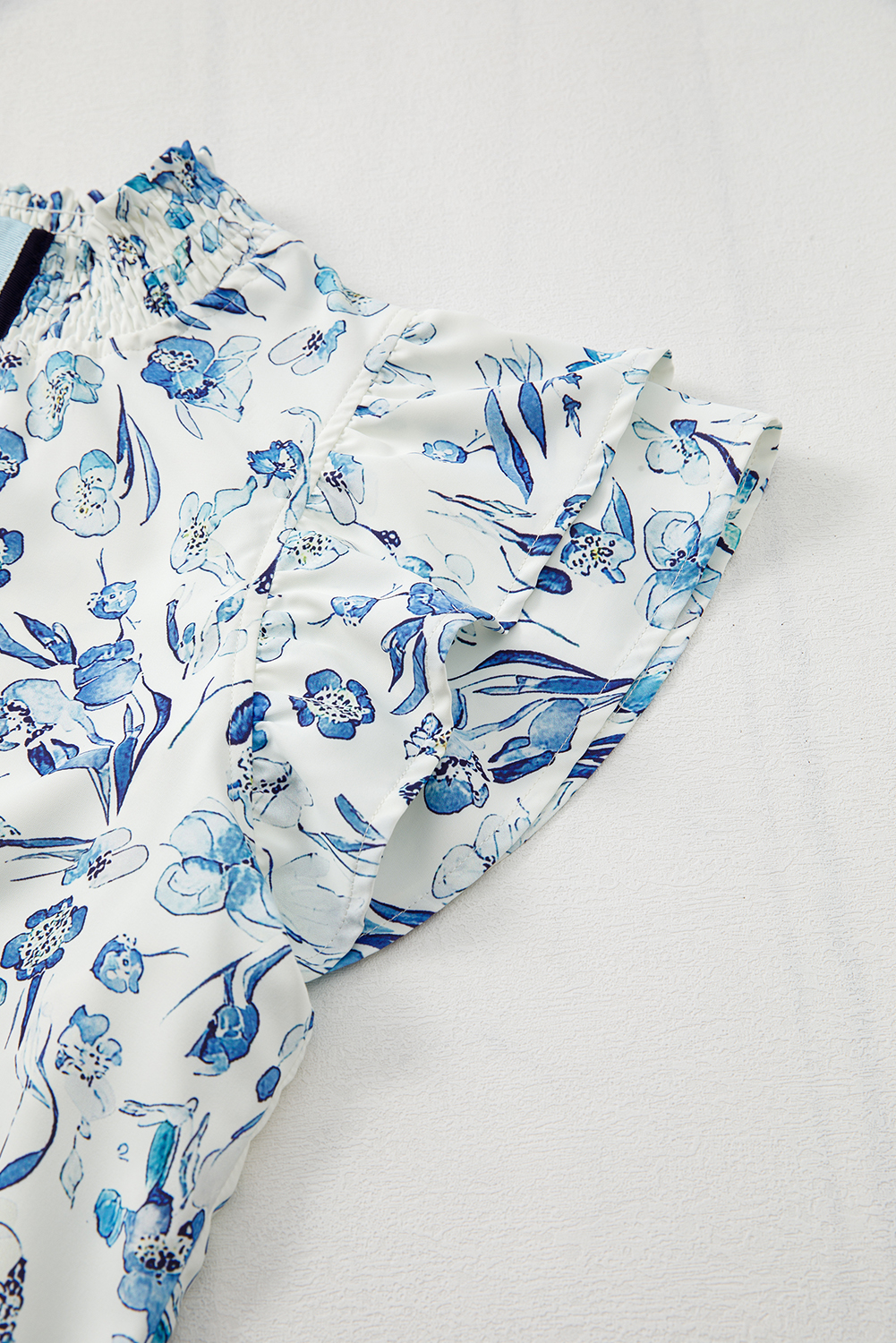 Women's Sky Blue Floral Print Ruffled Short Sleeve Blouse – Stylish Summer Top - Detail View 9 Women's Sky Blue Floral Print Ruffled Short Sleeve Blouse – Stylish Summer Top - Detail View 9