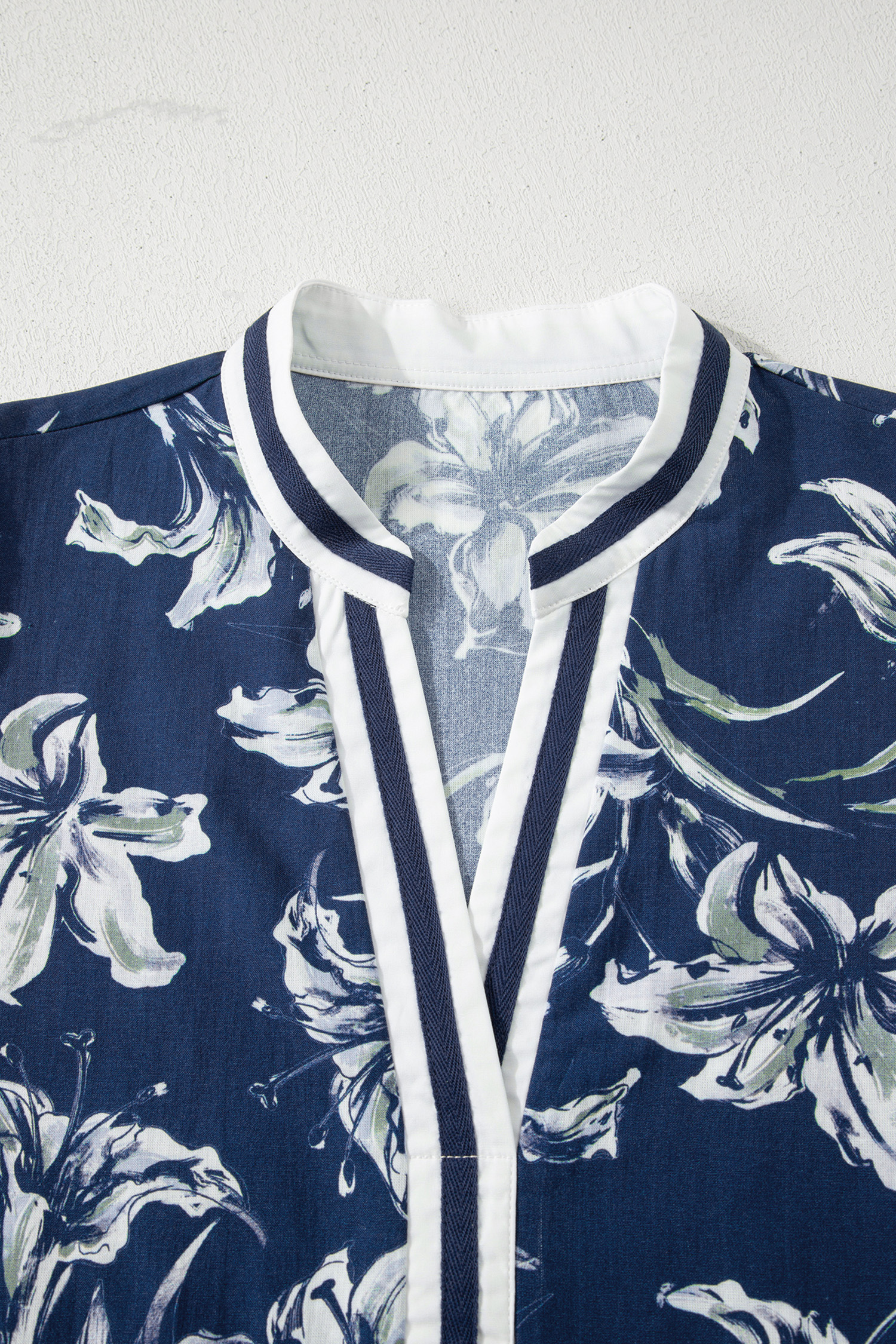 Casual Blue Floral Print Blouse for Women - Short Puff Sleeve Design, Ideal for Summer Days - Detail View 6 Casual Blue Floral Print Blouse for Women - Short Puff Sleeve Design, Ideal for Summer Days - Detail View 6