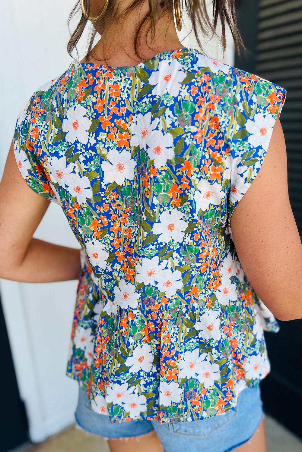 Chic and Romantic V Neck Floral Blouse with Bow Detail - Sleeveless Peplum Style - Detail View 2 Chic and Romantic V Neck Floral Blouse with Bow Detail - Sleeveless Peplum Style - Detail View 2