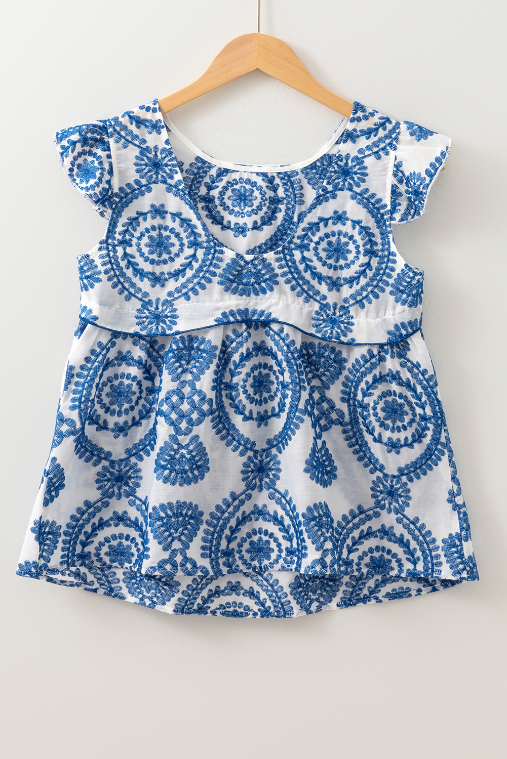 Effortless Summer Look: Blue Crew Neck Blouse with Feminine Flutter Sleeves - Detail View 3 Effortless Summer Look: Blue Crew Neck Blouse with Feminine Flutter Sleeves - Detail View 3