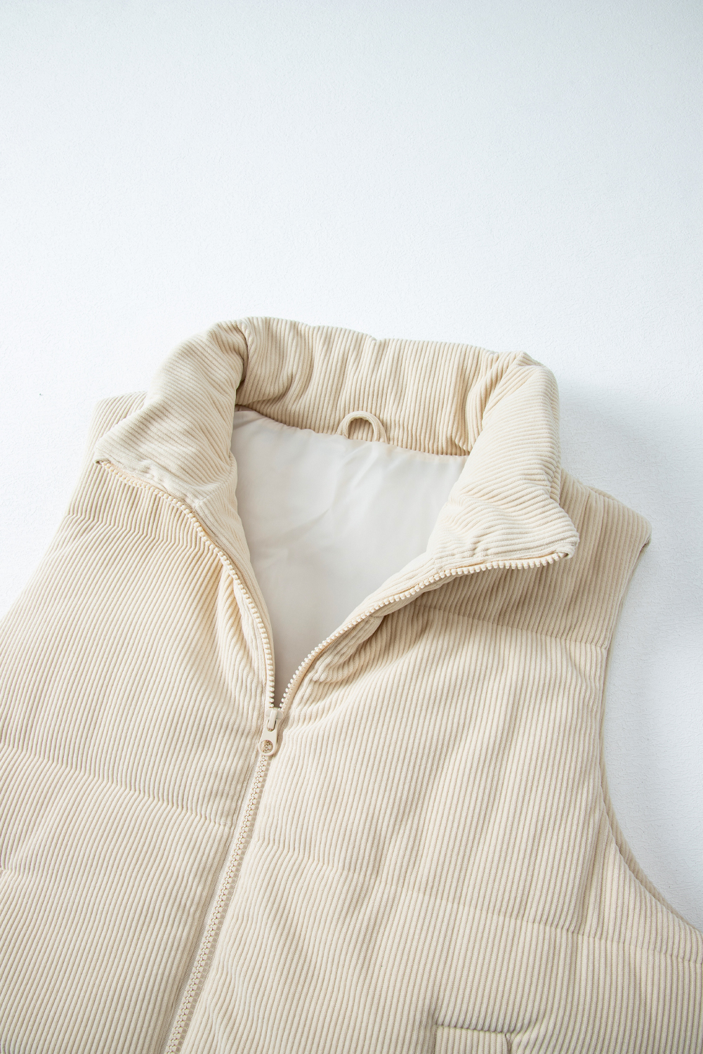 Women's Beige Corduroy Stand Neck Zipped Puffer Vest for Daily Wear - Detail View 13 Women's Beige Corduroy Stand Neck Zipped Puffer Vest for Daily Wear - Detail View 13