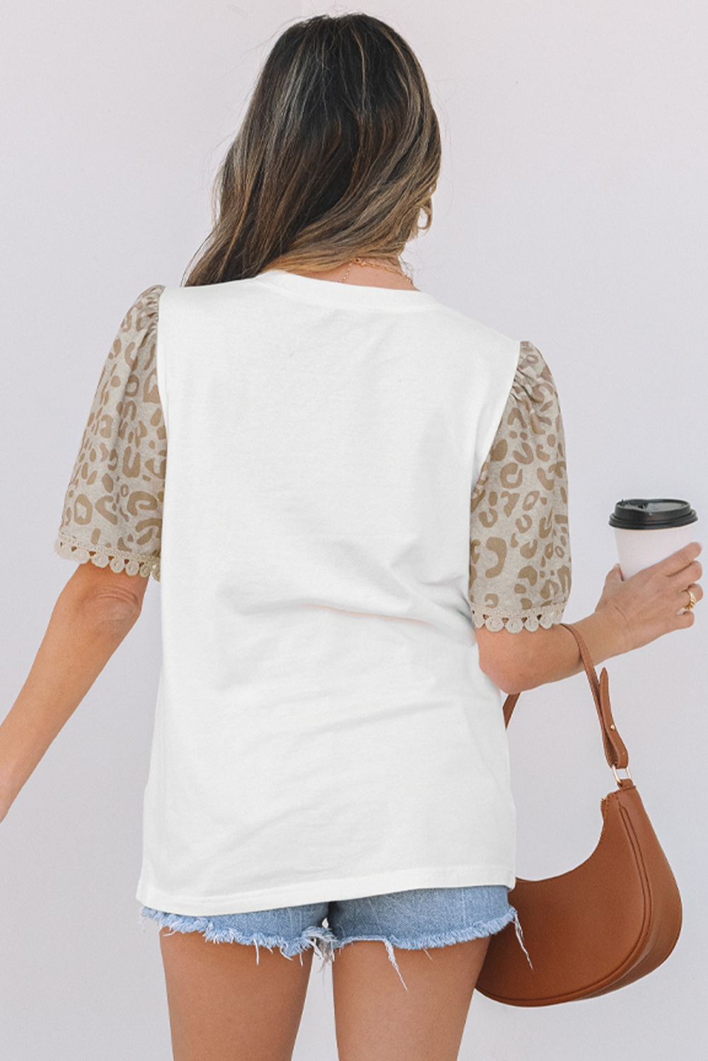 Chic White T-Shirt featuring Leopard Print, Puff Sleeves & Delicate Lace Detail - Detail View 2 Chic White T-Shirt featuring Leopard Print, Puff Sleeves & Delicate Lace Detail - Detail View 2