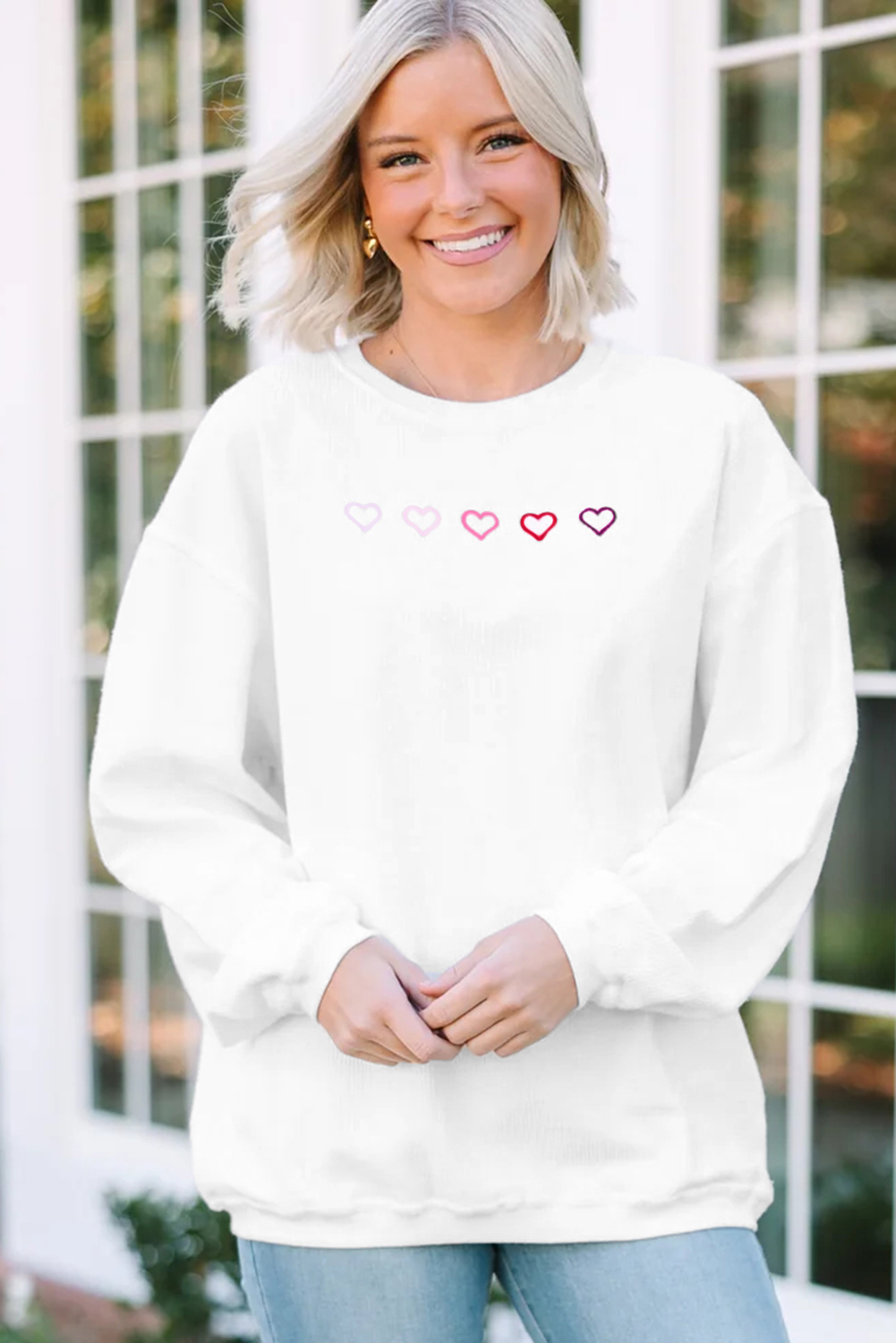 Casual White Drop Shoulder Sweatshirt with XOXO Heart Embroidery – Ideal for Daily Wear - Detail View 6 Casual White Drop Shoulder Sweatshirt with XOXO Heart Embroidery – Ideal for Daily Wear - Detail View 6