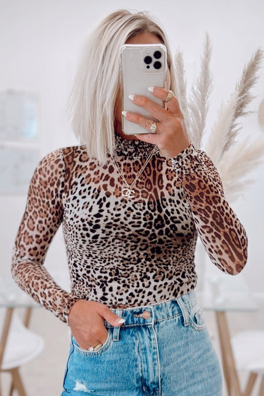 Elegant Leopard Print Bodysuit with Smocked Neck and Long Sleeves for Stylish Looks - Detail View 2 Elegant Leopard Print Bodysuit with Smocked Neck and Long Sleeves for Stylish Looks - Detail View 2