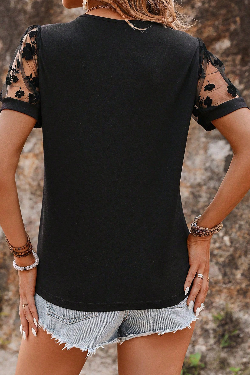Elegant and Breathable Black Plus Size T-Shirt with Floral Mesh Cutouts - Detail View 2 Elegant and Breathable Black Plus Size T-Shirt with Floral Mesh Cutouts - Detail View 2