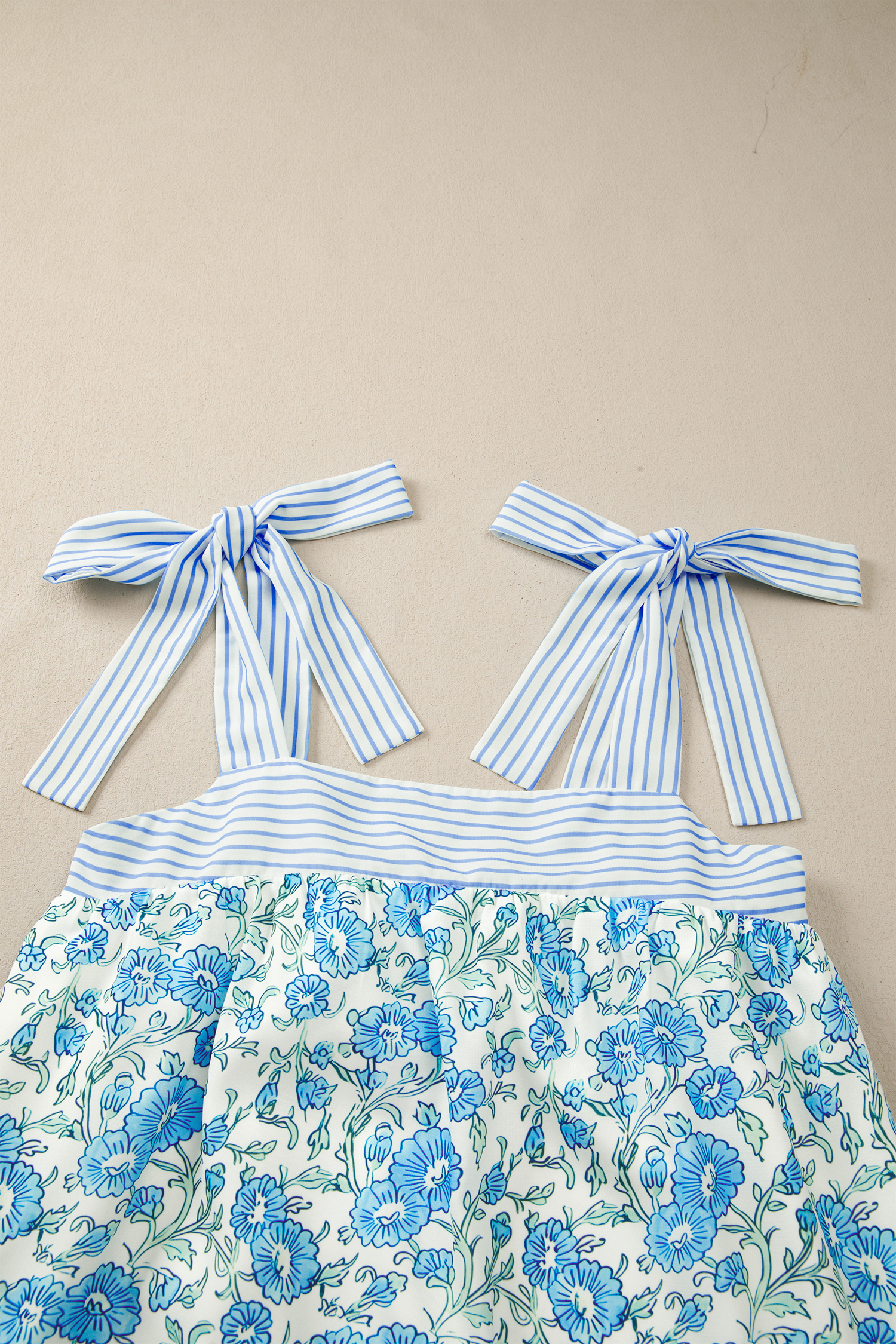 Stylish Sky Blue Patchwork Mini Dress – Floral Print for Casual Summer Outings - Detail View 9 Stylish Sky Blue Patchwork Mini Dress – Floral Print for Casual Summer Outings - Detail View 9