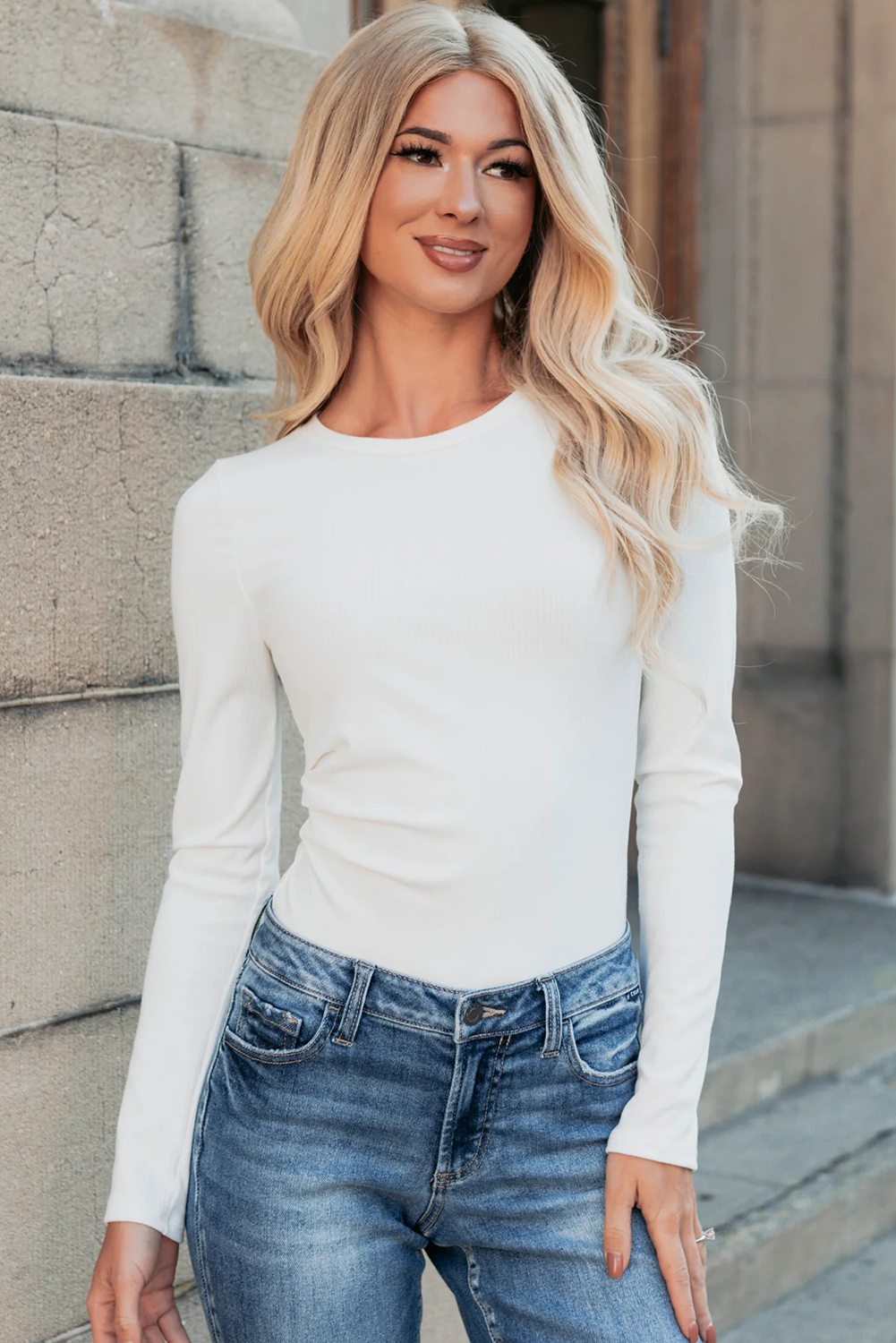 Autumn Women's Solid White Ribbed Bodysuit with Long Sleeves for Seasonal Layering - Detail View 5 Autumn Women's Solid White Ribbed Bodysuit with Long Sleeves for Seasonal Layering - Detail View 5