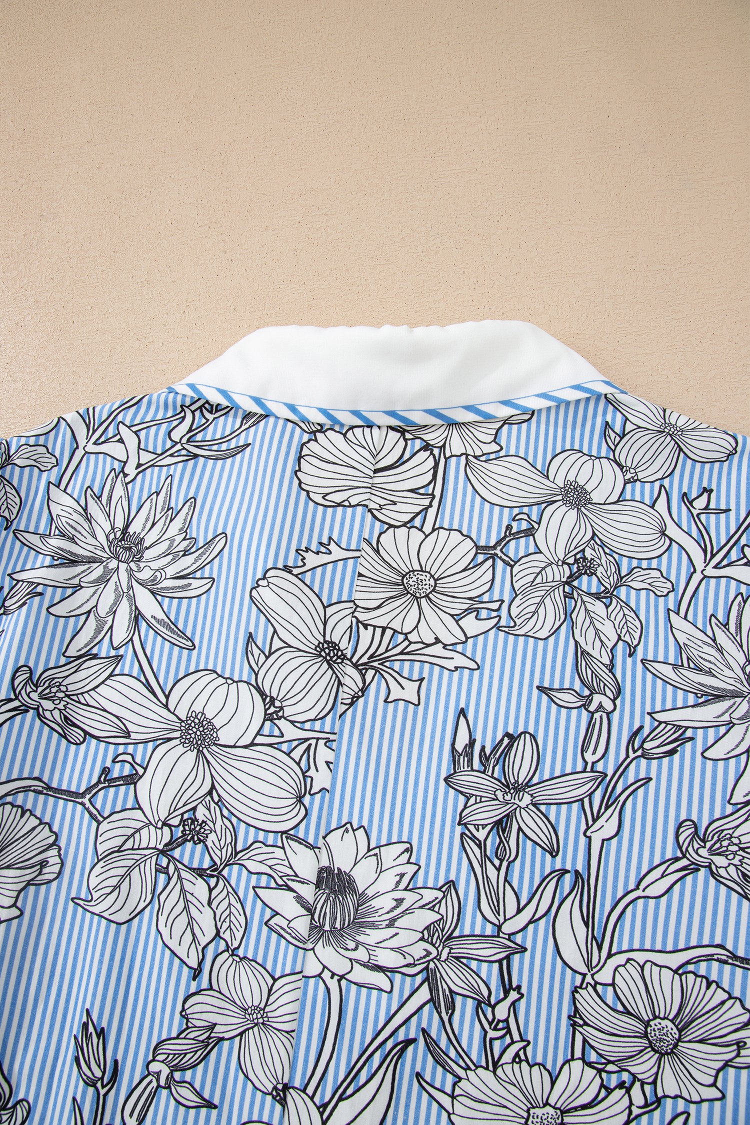 Women's Sky Blue Floral Striped Polo Blouse – Casual Short Sleeve Top for Summer Outings - Detail View 7 Women's Sky Blue Floral Striped Polo Blouse – Casual Short Sleeve Top for Summer Outings - Detail View 7