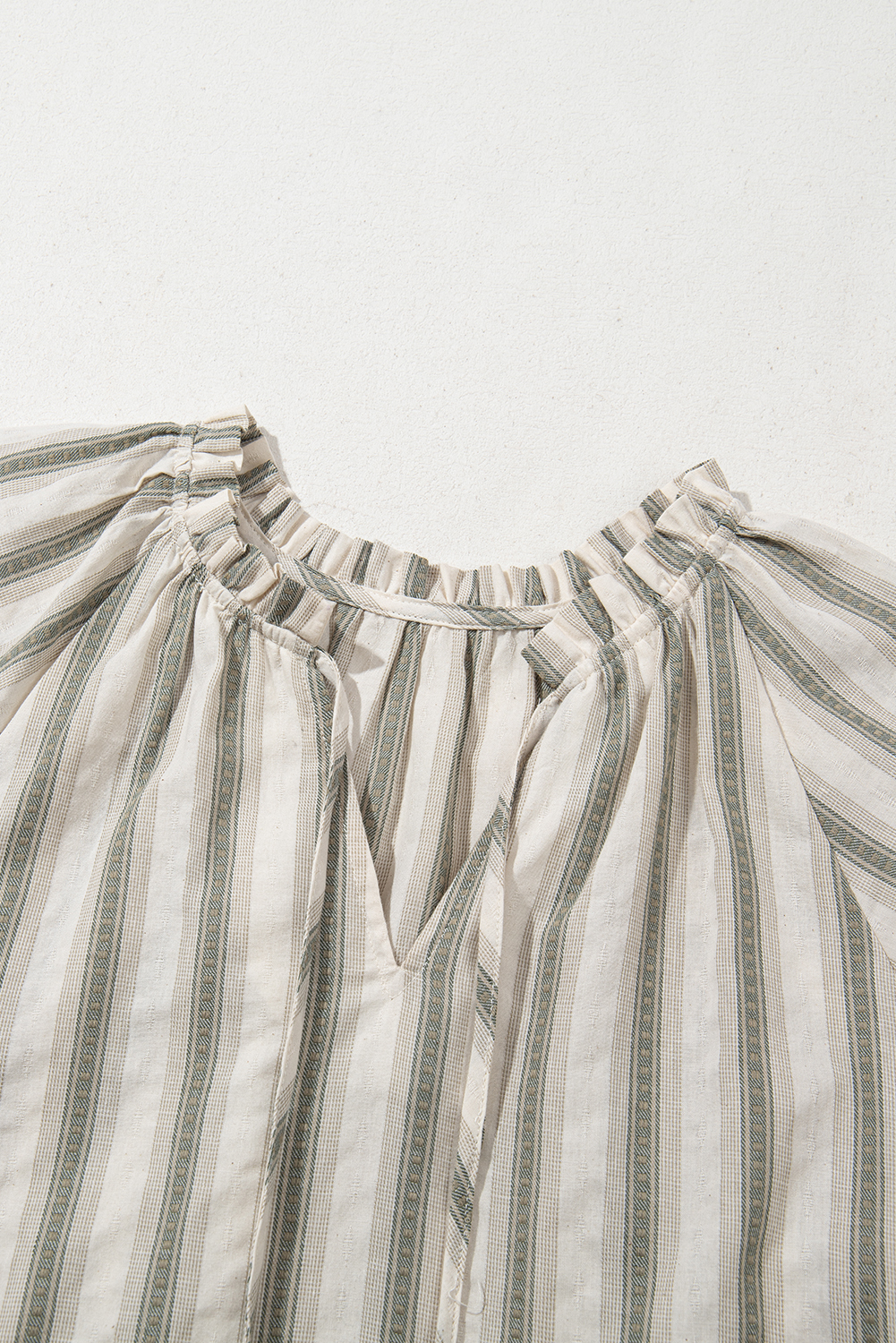 Short Puff Sleeve Gray Blouse with Tie Accent - Versatile and Stylish for Every Occasion - Detail View 11 Short Puff Sleeve Gray Blouse with Tie Accent - Versatile and Stylish for Every Occasion - Detail View 11