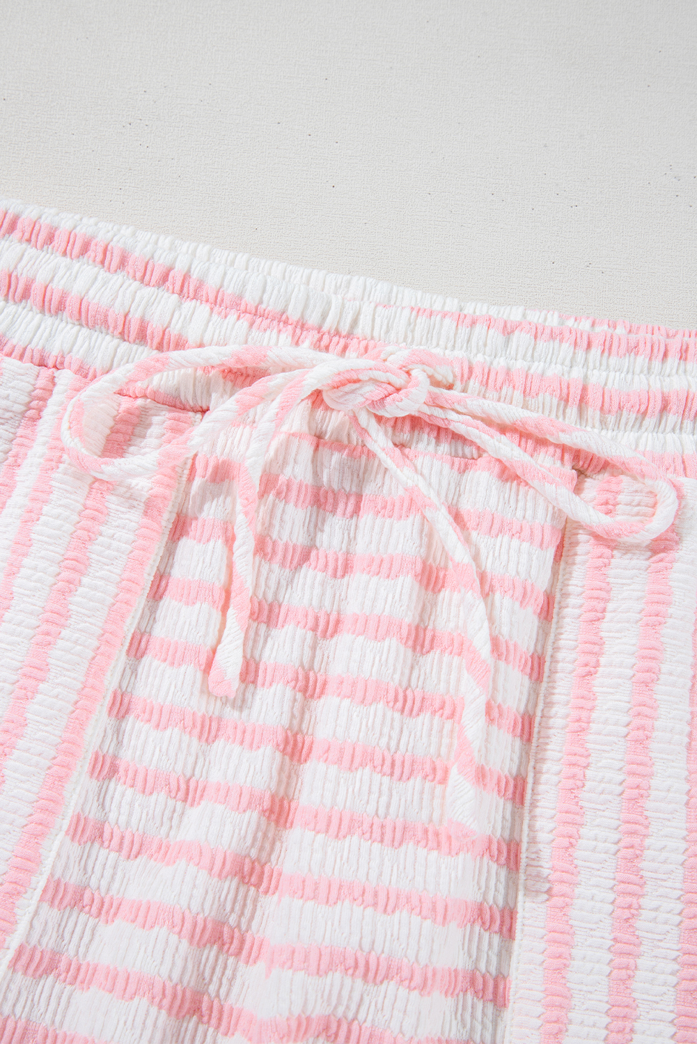 Stylish Casual Two-Piece Set: Pink Striped Top with Short Sleeves and Drawstring Shorts - Detail View 14 Stylish Casual Two-Piece Set: Pink Striped Top with Short Sleeves and Drawstring Shorts - Detail View 14