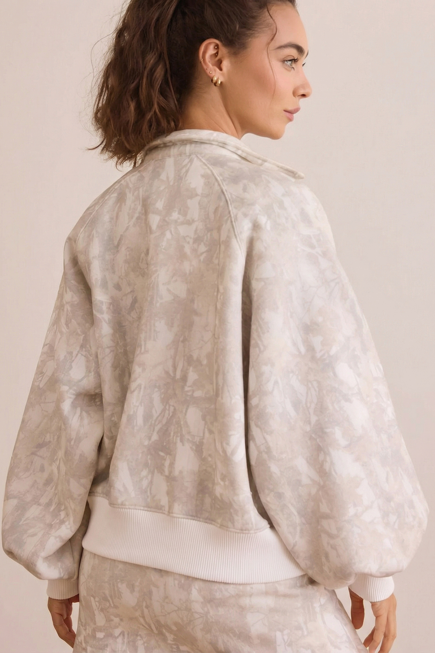 Stylish White Abstract Print Balloon Sleeve Pullover with Mini Skort for Women – Perfect for Spring - Detail View 3 Stylish White Abstract Print Balloon Sleeve Pullover with Mini Skort for Women – Perfect for Spring - Detail View 3
