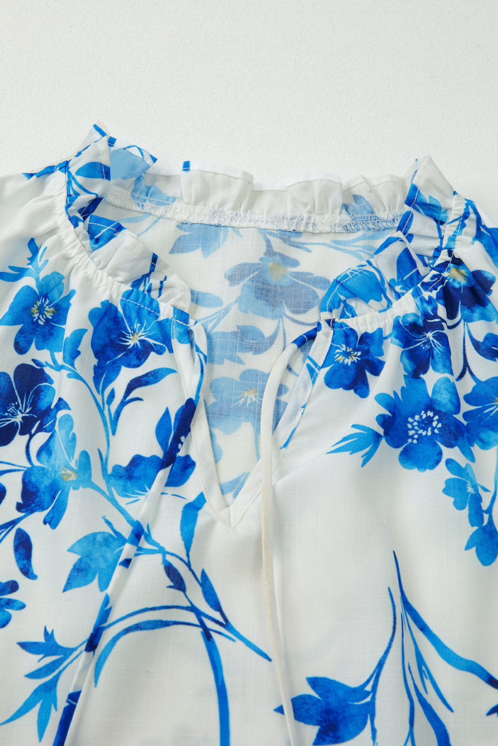 Women's Blue Floral Long Sleeve Lace-up V Neck Blouse for Casual Spring Outfits - Detail View 5 Women's Blue Floral Long Sleeve Lace-up V Neck Blouse for Casual Spring Outfits - Detail View 5