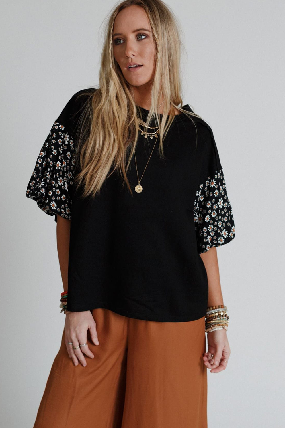 Casual Summer Top for Women: Black Crew Neck with Eye-Catching Design - Detail View 3 Casual Summer Top for Women: Black Crew Neck with Eye-Catching Design - Detail View 3