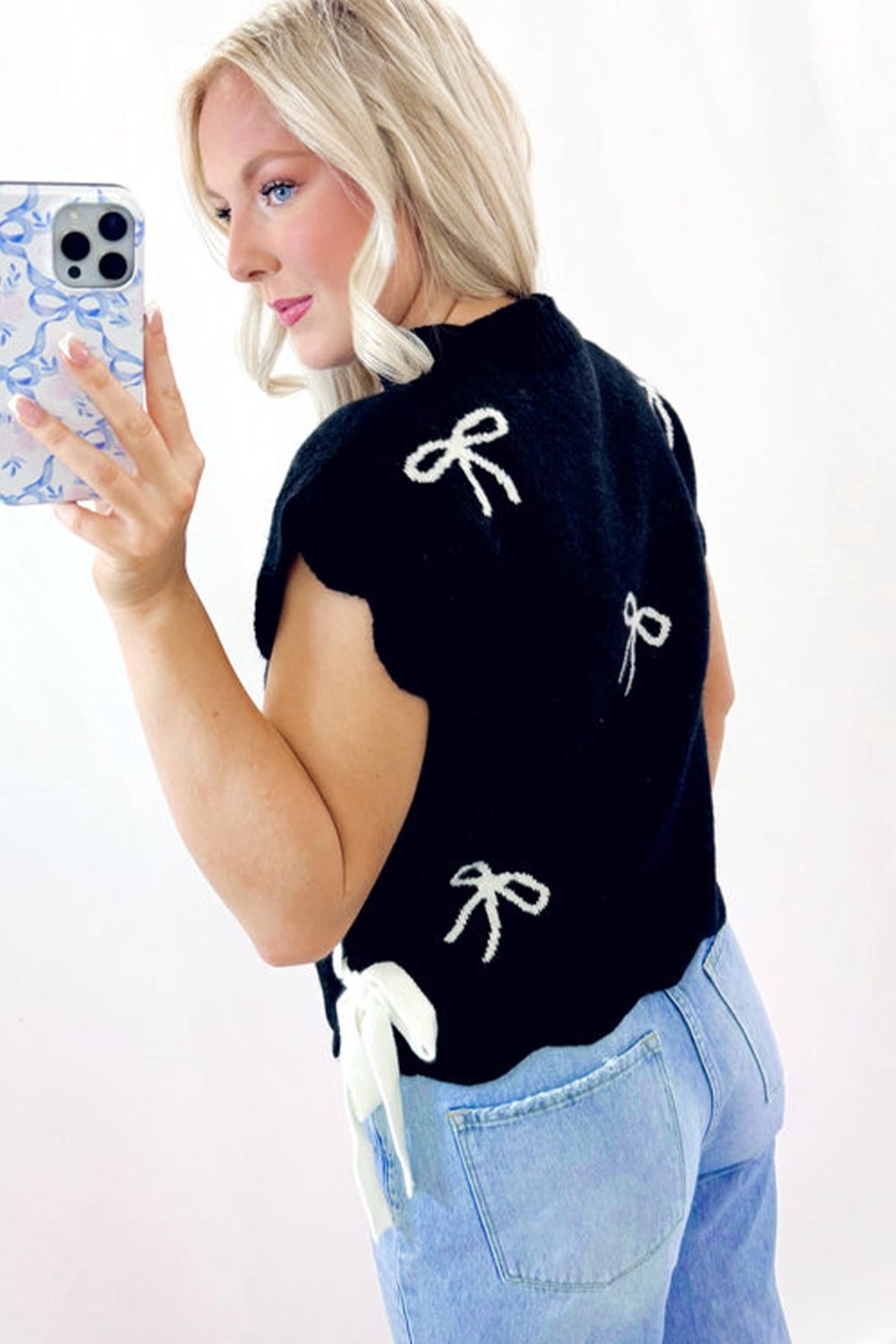 Charming Black Sweater T-Shirt with Bow Print & Unique Side Ties - Detail View 2 Charming Black Sweater T-Shirt with Bow Print & Unique Side Ties - Detail View 2