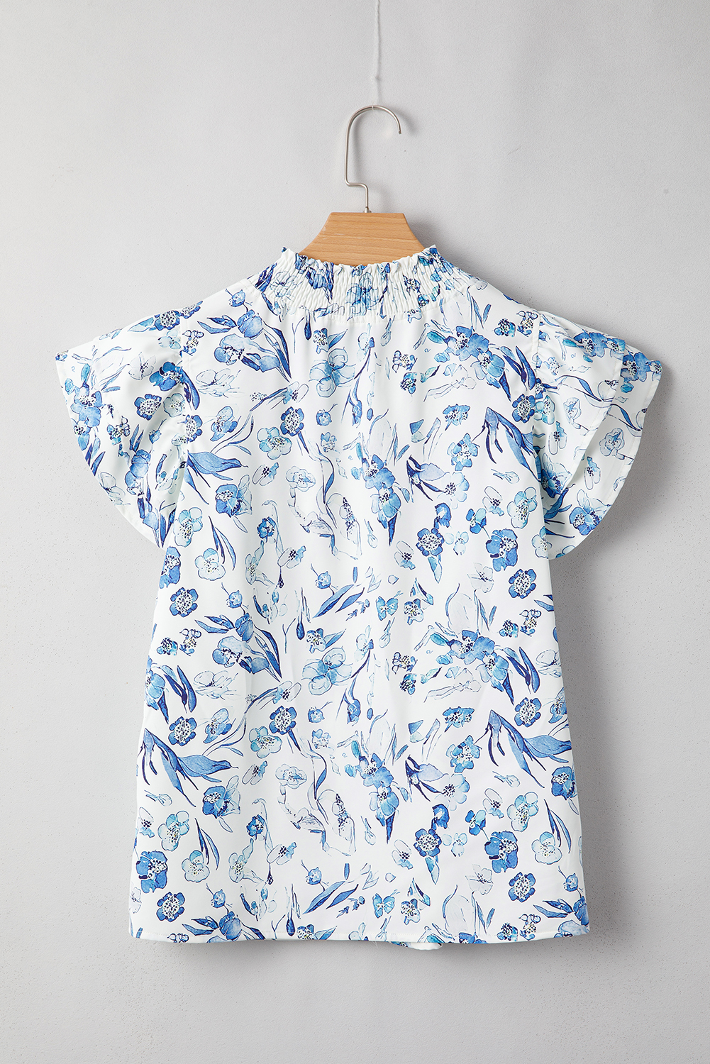 Chic Floral Blouse with Smocked Neckline and Ruffled Sleeves for Everyday Wear - Detail View 6 Chic Floral Blouse with Smocked Neckline and Ruffled Sleeves for Everyday Wear - Detail View 6