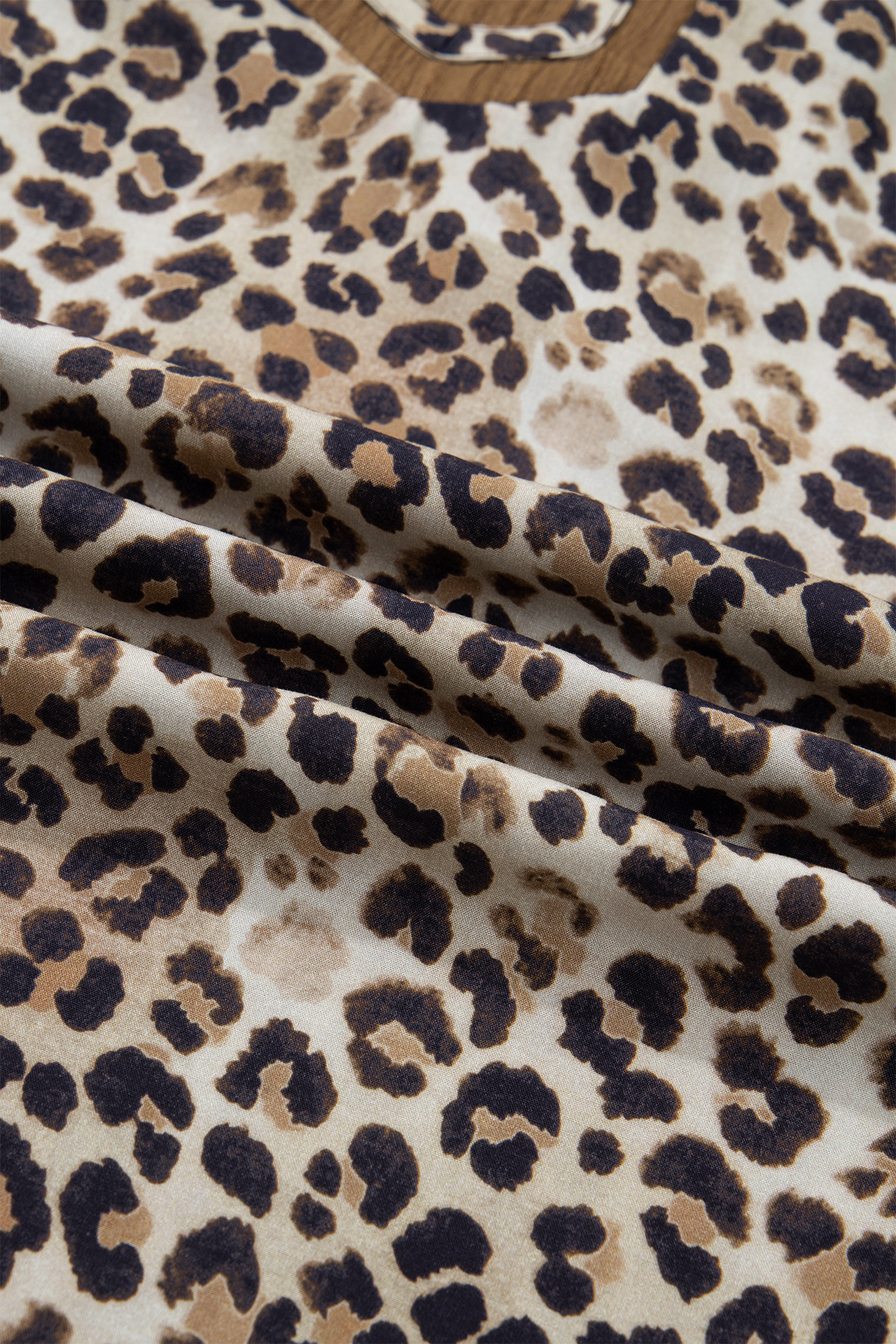 Chic Brown Colorblock Leopard Blouse – Short Sleeve V Neck Top Ideal for Summer Outings - Detail View 9 Chic Brown Colorblock Leopard Blouse – Short Sleeve V Neck Top Ideal for Summer Outings - Detail View 9